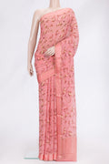 Peach Dual Tone Mysore Georgette Saree with Printed design on the body and Zari Border.  displayed on a mannequin