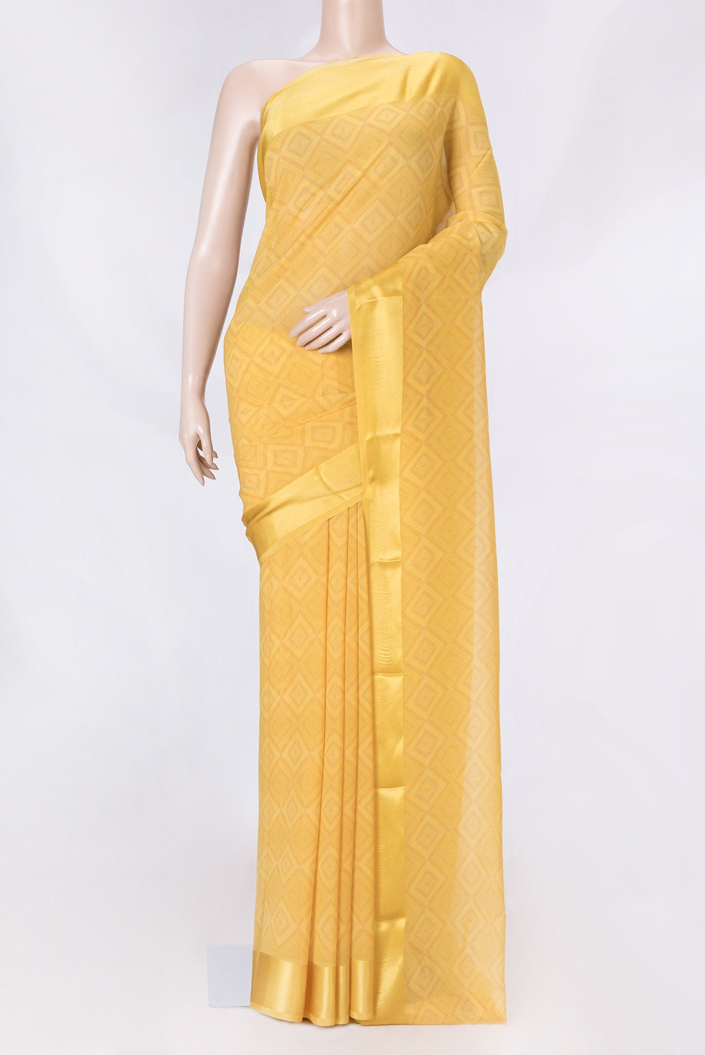 Yellow Dual Tone Georgette Saree with Printed design on the body and Zari Border displayed on a mannequin