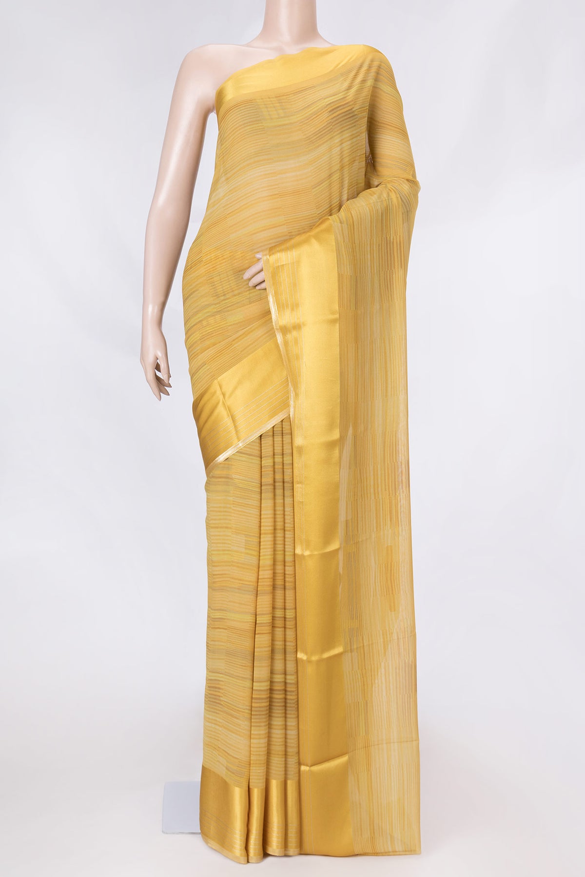 Yellow Dual Tone Georgette Saree with Printed design on the body and Zari Border displayed on a mannequin