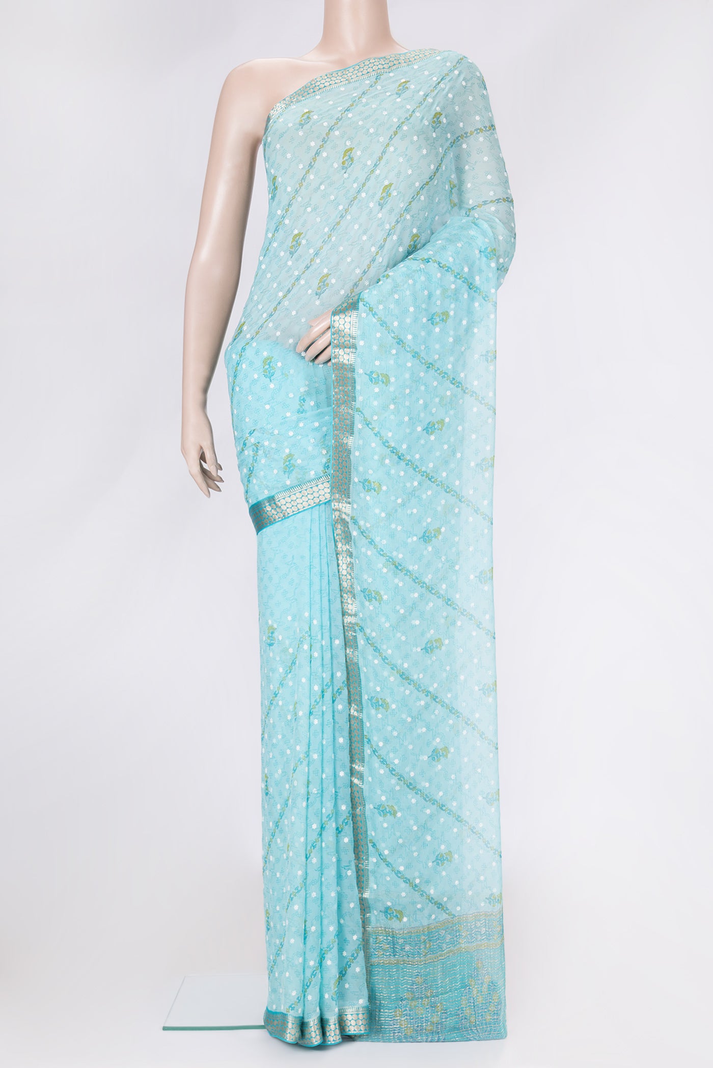 Sky Blue Dual Tone Chiffon Saree with Embroidery on the body and Zari Border.  displayed on a mannequin