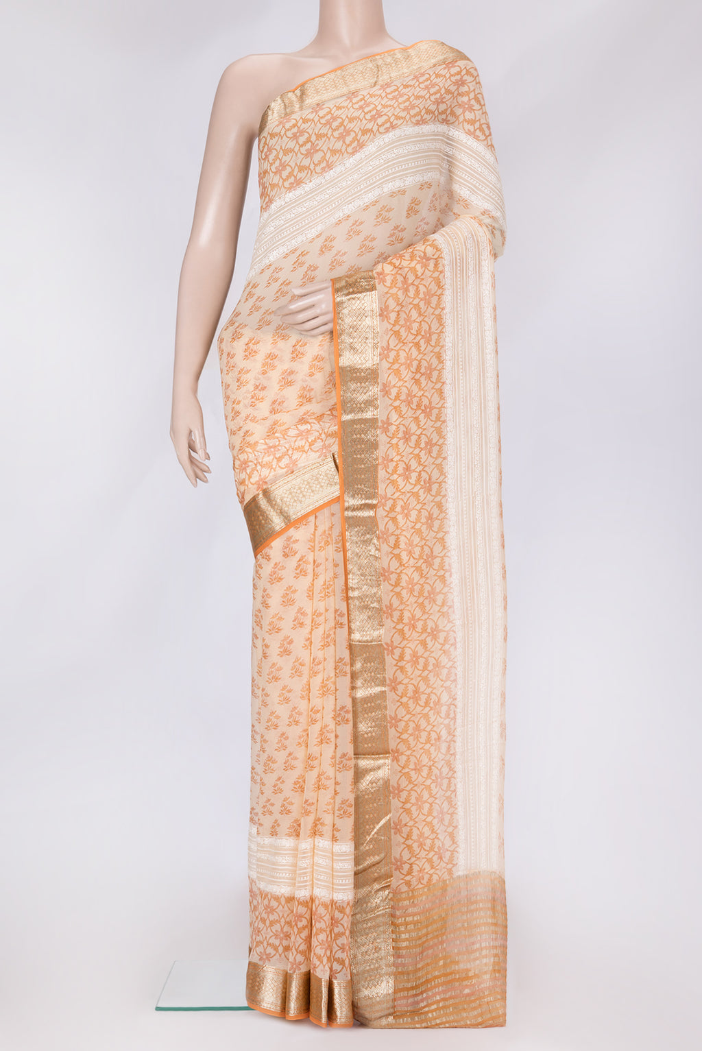 Sandal Dual Tone Mysore Chiffon Saree with Printed design on the body and Zari Border.  displayed on a mannequin