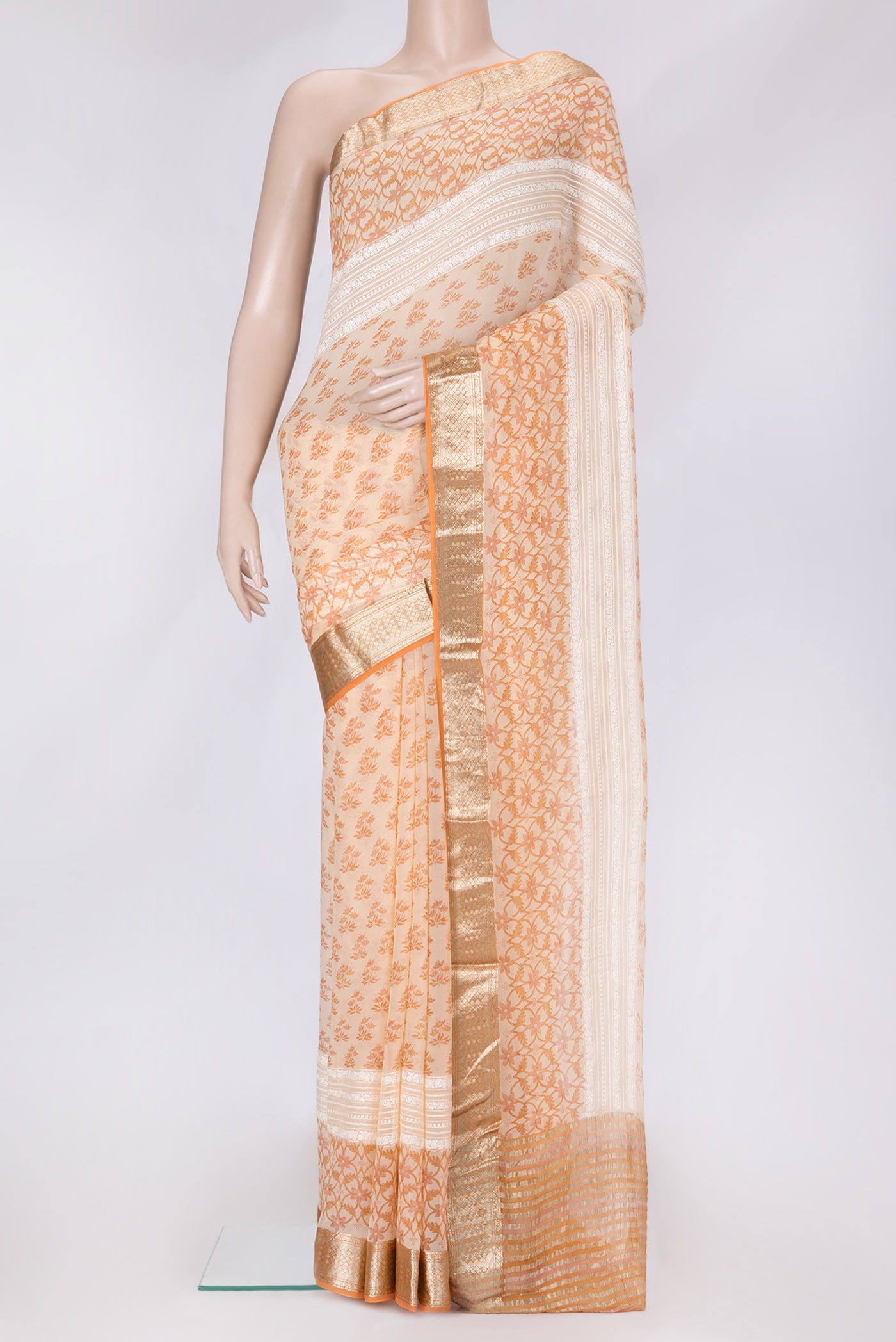 Sandal Dual Tone Mysore Chiffon Saree with Printed design on the body and Zari Border.  displayed on a mannequin