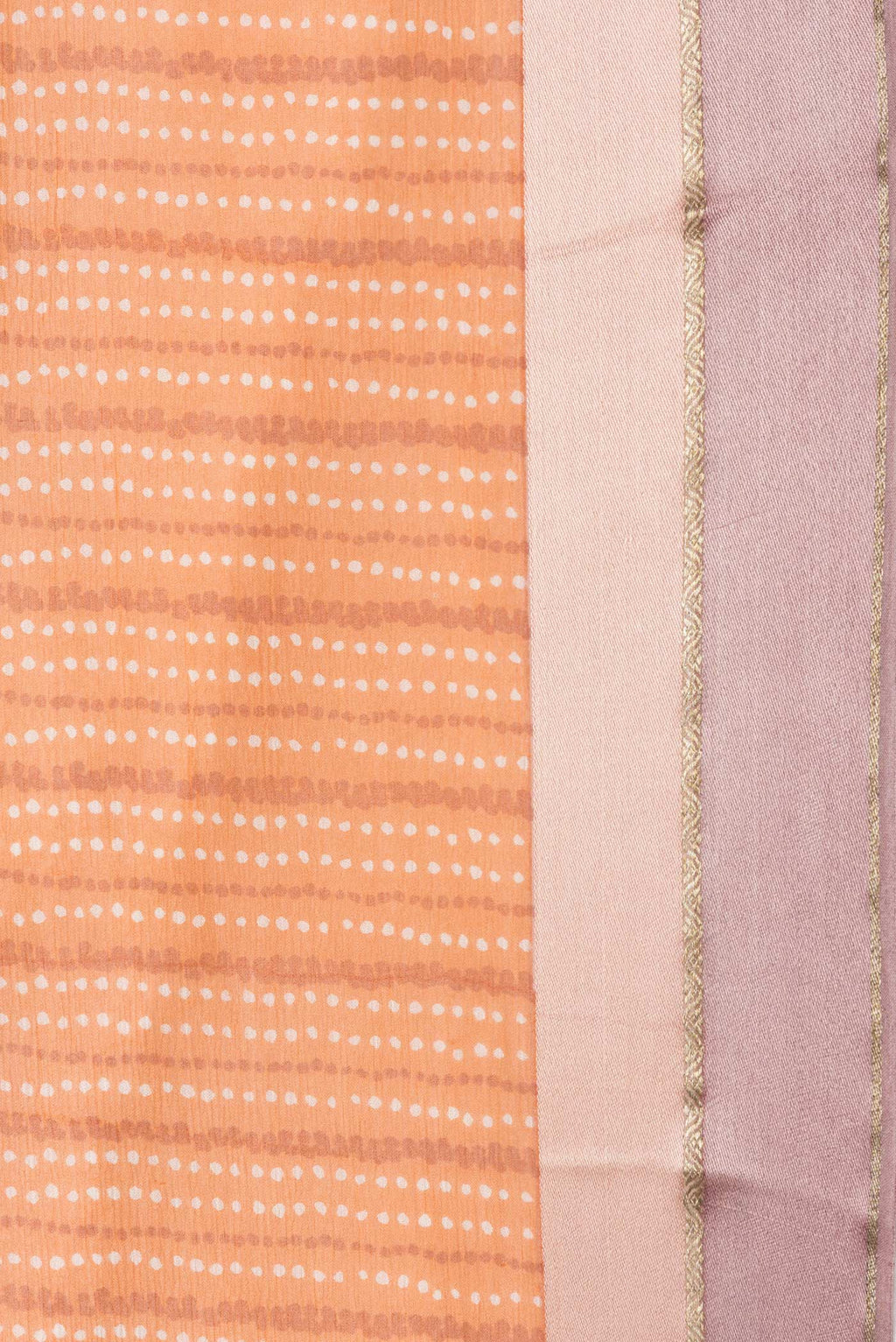 Border image of Peach Dual Tone Chiffon Saree with Printed design on the body and Zari Border. 