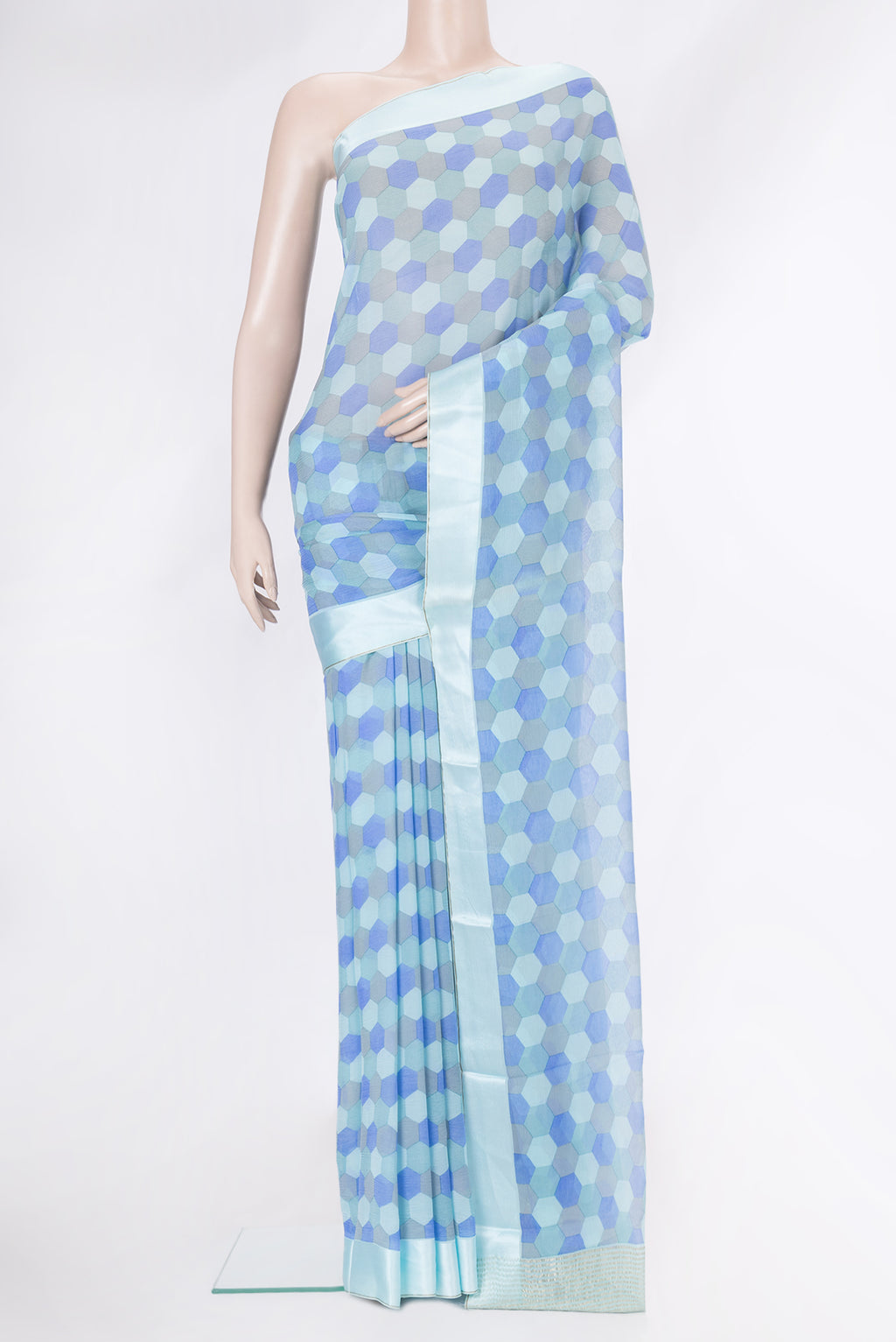 Sky Blue Dual Tone Mysore Chiffon Saree with Printed design on the body and Satin Border.  displayed on a mannequin