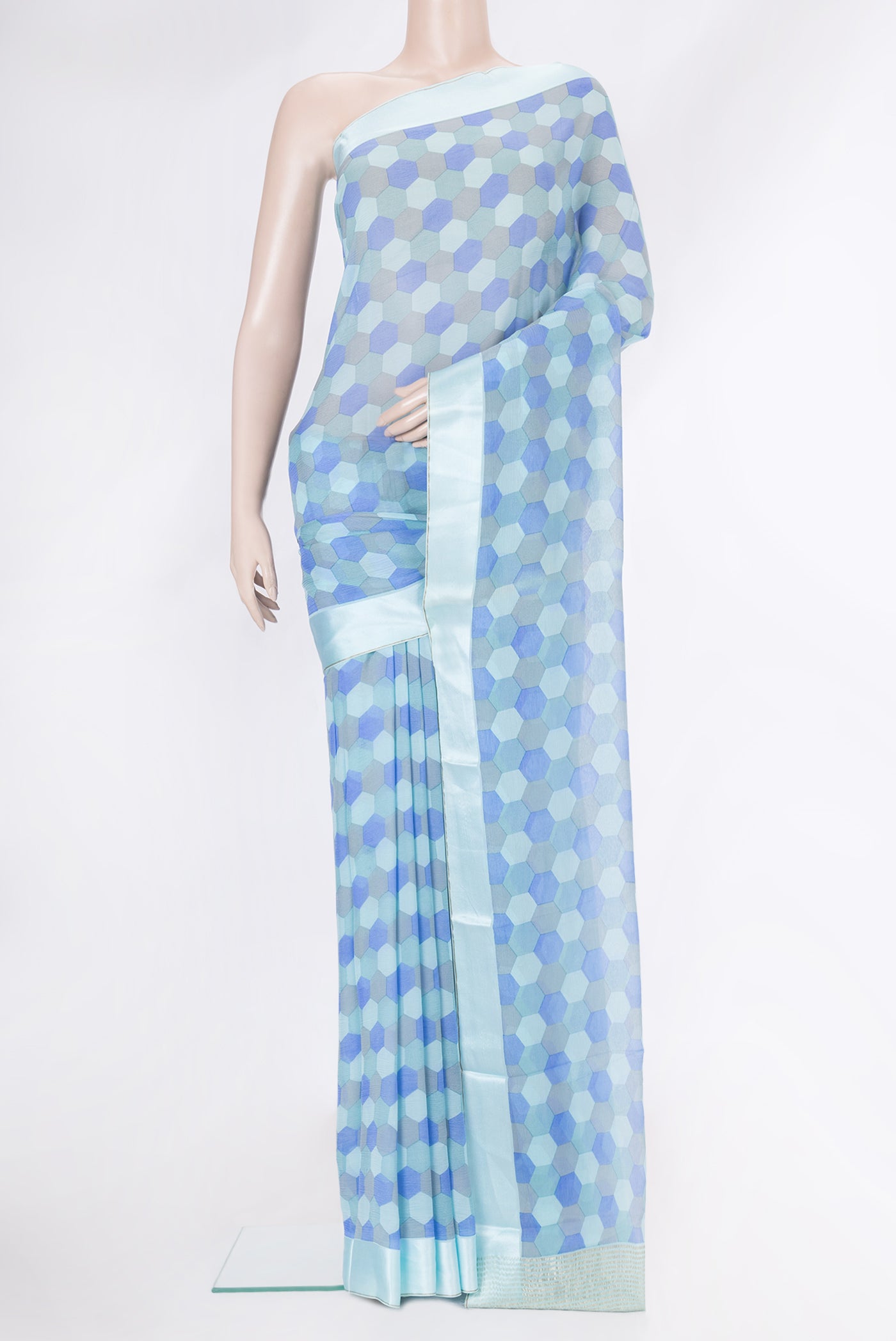 Sky Blue Dual Tone Mysore Chiffon Saree with Printed design on the body and Satin Border.  displayed on a mannequin