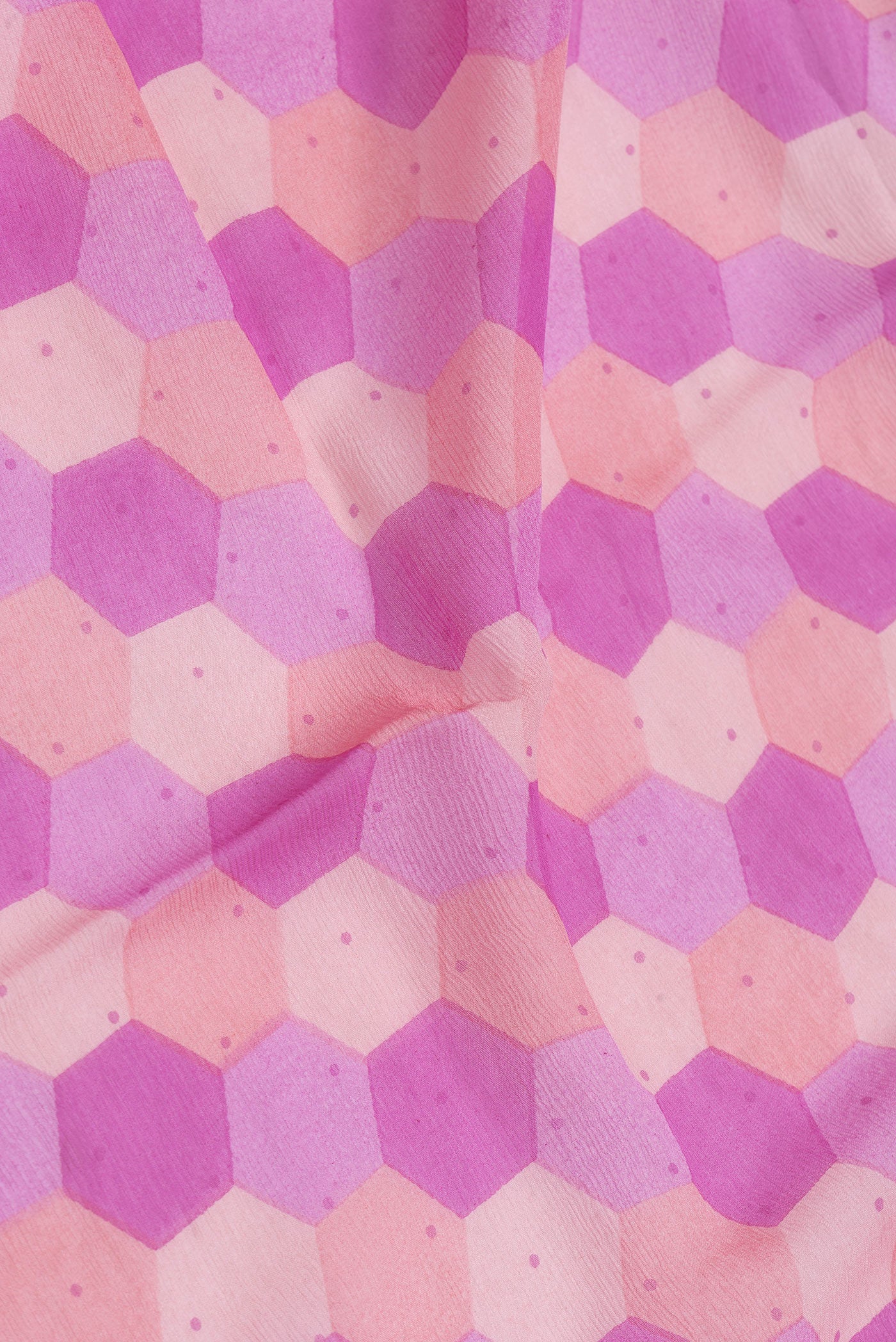 Close up of Pink Dual Tone Mysore Chiffon Saree with Printed design on the body and Plain Border.  displaying folds