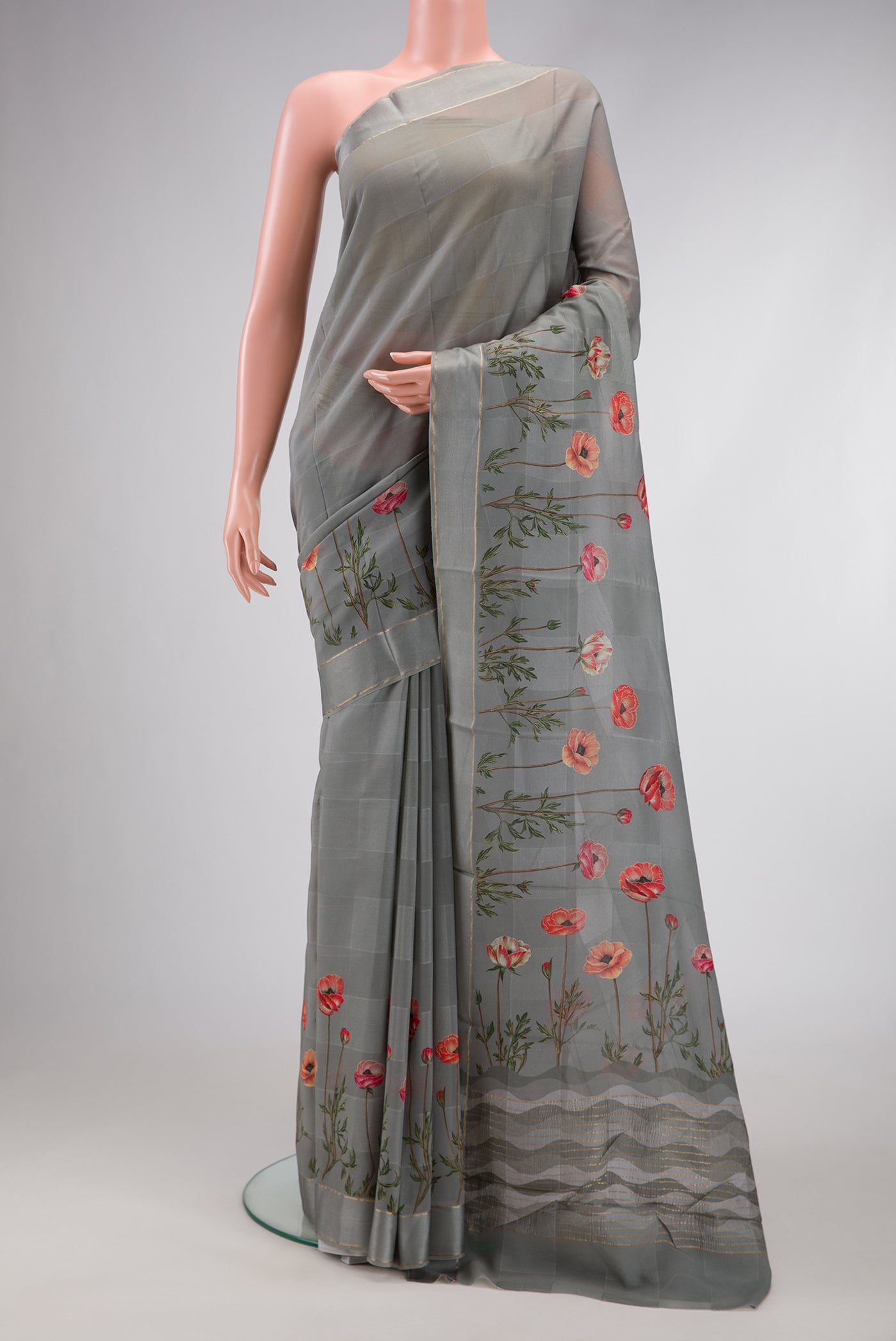 Grey Dual Tone Mysore Crepe Saree with Printed design on the body and Fancy Border.  displayed on a mannequin