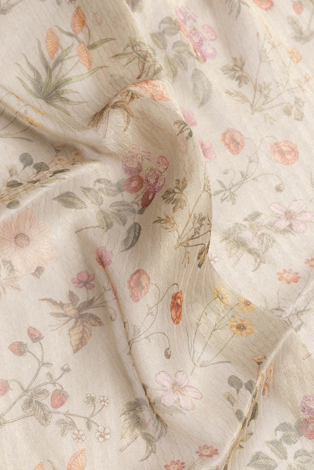 Close up of Beige Dual Tone Mysore Georgette Saree with Printed design on the body and Fancy Border.  displaying folds