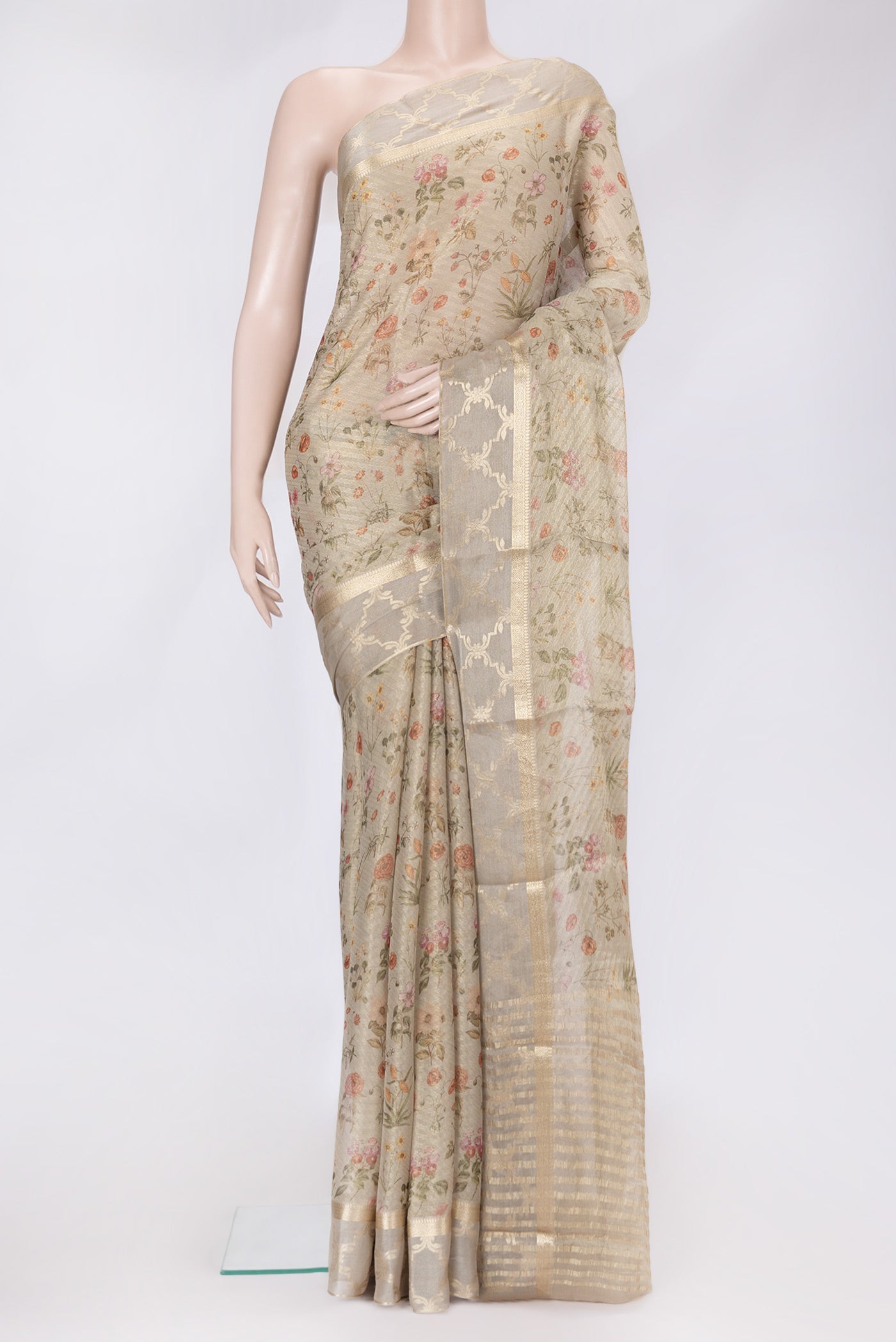 Beige Dual Tone Mysore Georgette Saree with Printed design on the body and Fancy Border.  displayed on a mannequin
