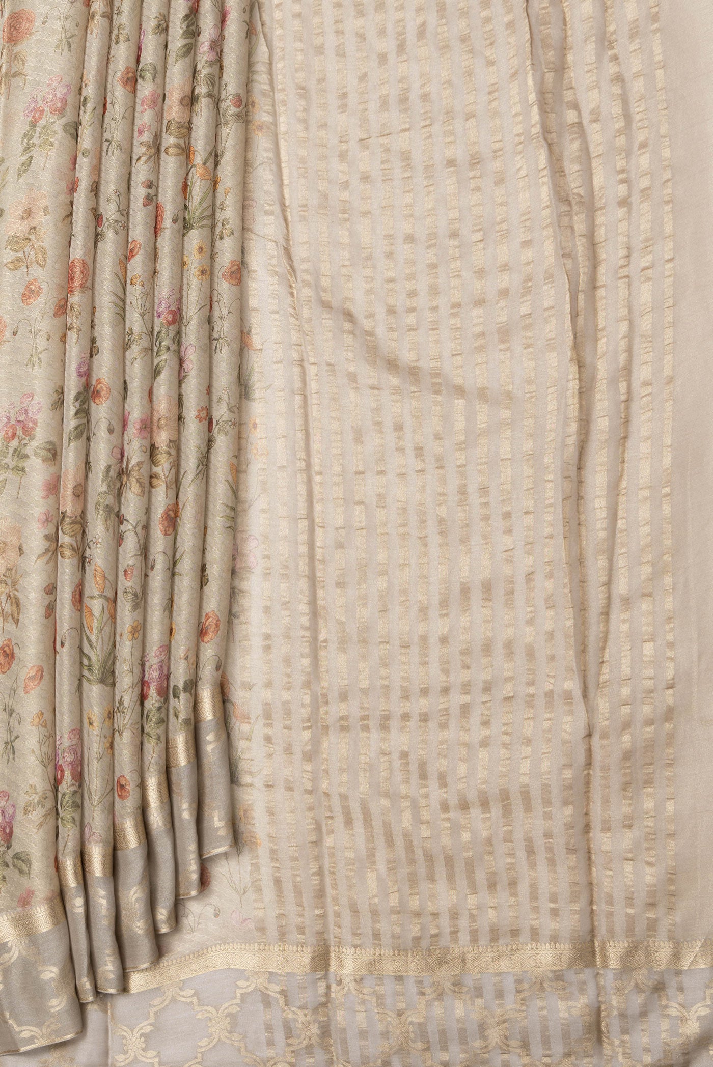 Pleats and pallu of Beige Dual Tone Mysore Georgette Saree with Printed design on the body and Fancy Border. 