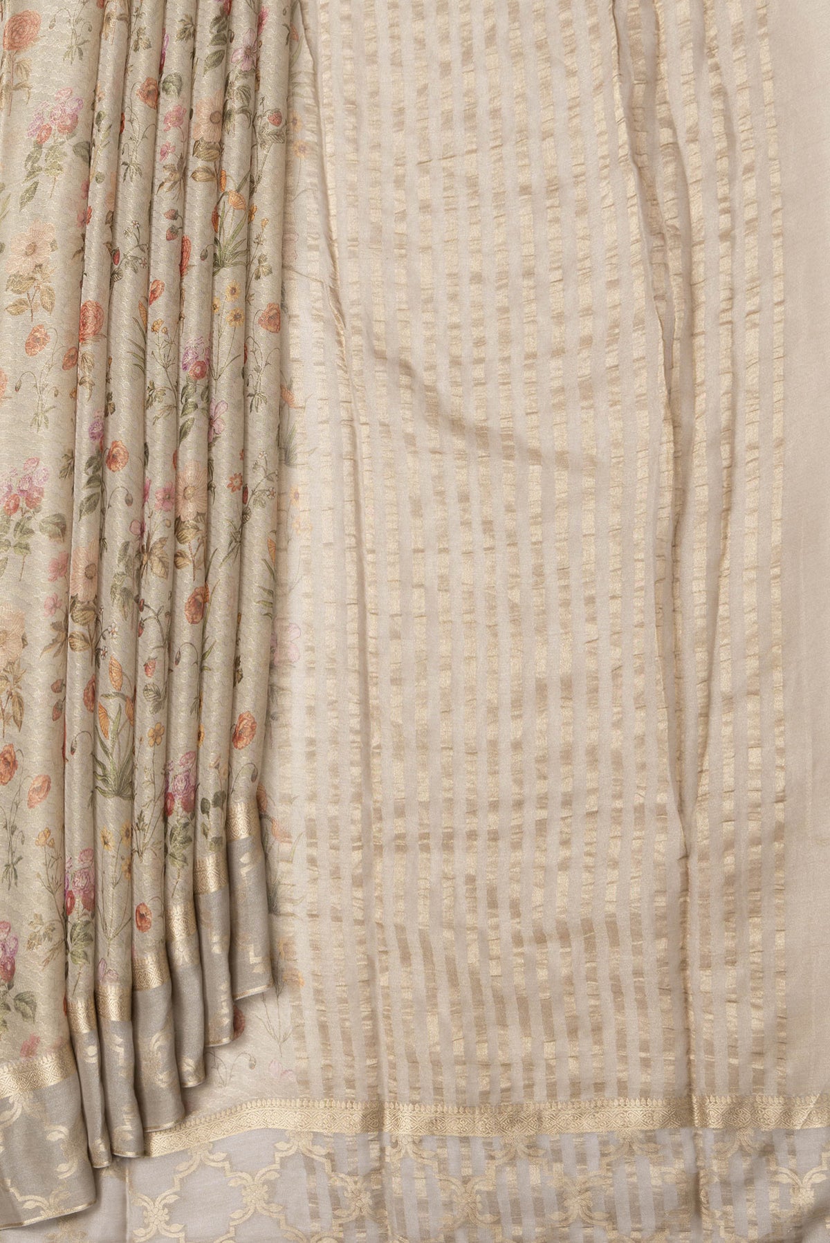 Pleats and pallu of Beige Dual Tone Mysore Georgette Saree with Printed design on the body and Fancy Border. 