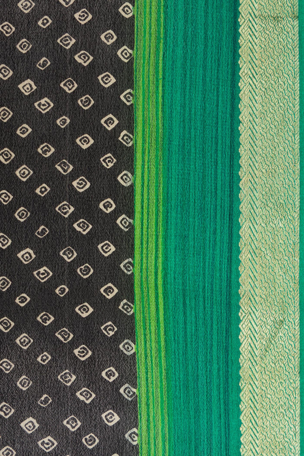 Border image of Black Dual Tone Mysore Crepe Saree with Bandhani Print on the body and Zari Border. 
