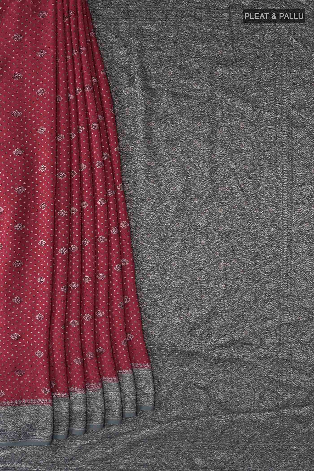 Pleats and pallu of Maroon Banarasi Georgette Saree with Zari Butta on the body and Zari Border