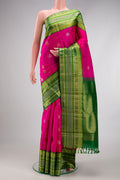 Pure Silk Pure Zari Rani Pink Kanchipuram Saree with Zari Butta on the body and Zari Border.  displayed on a mannequin