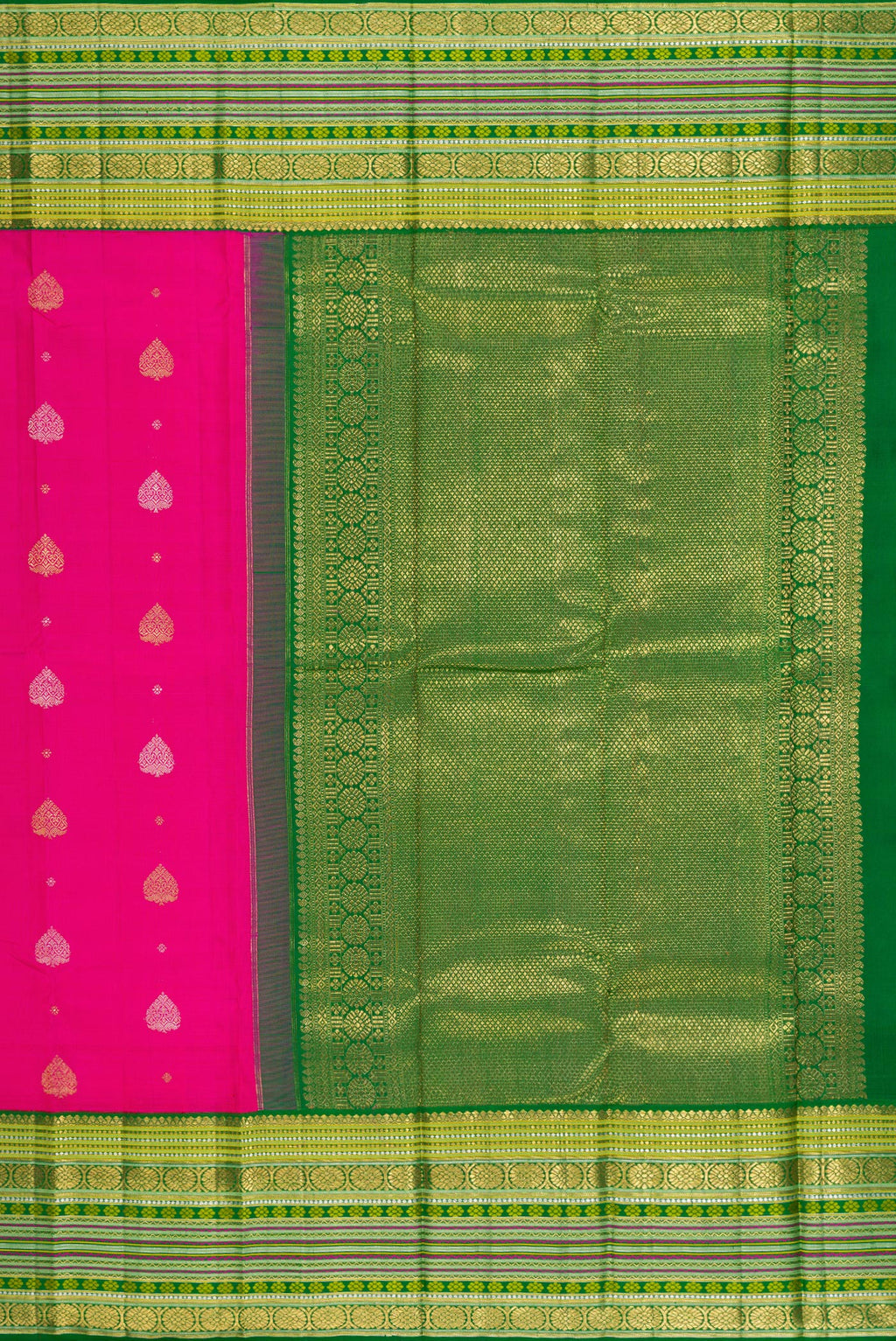 Close up image of the pallu of Pure Silk Pure Zari Rani Pink Kanchipuram Saree with Zari Butta on the body and Zari Border. 