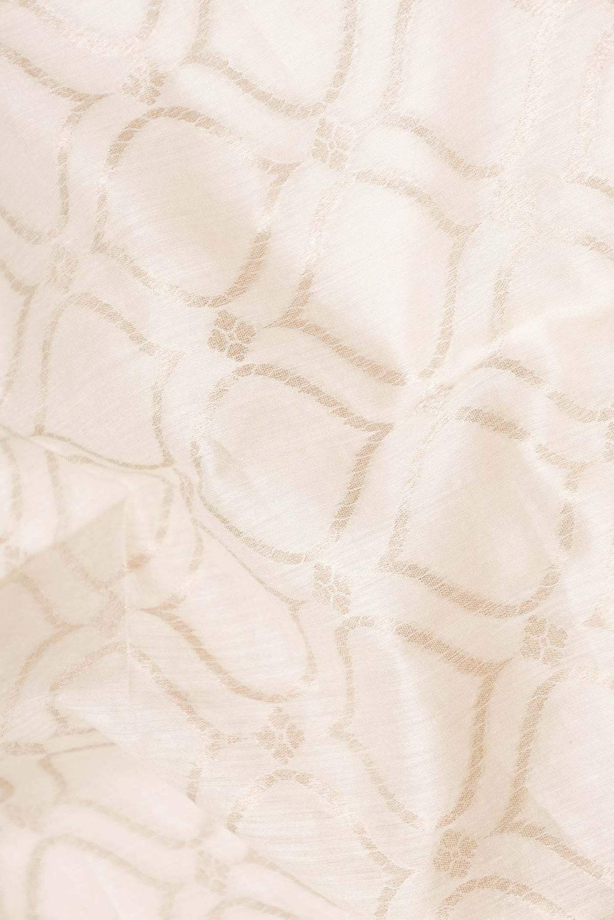 Close up of Sandal Dual Tone Tussar Silk Saree with Zari Brocade on the body and Embroidery Border displaying folds