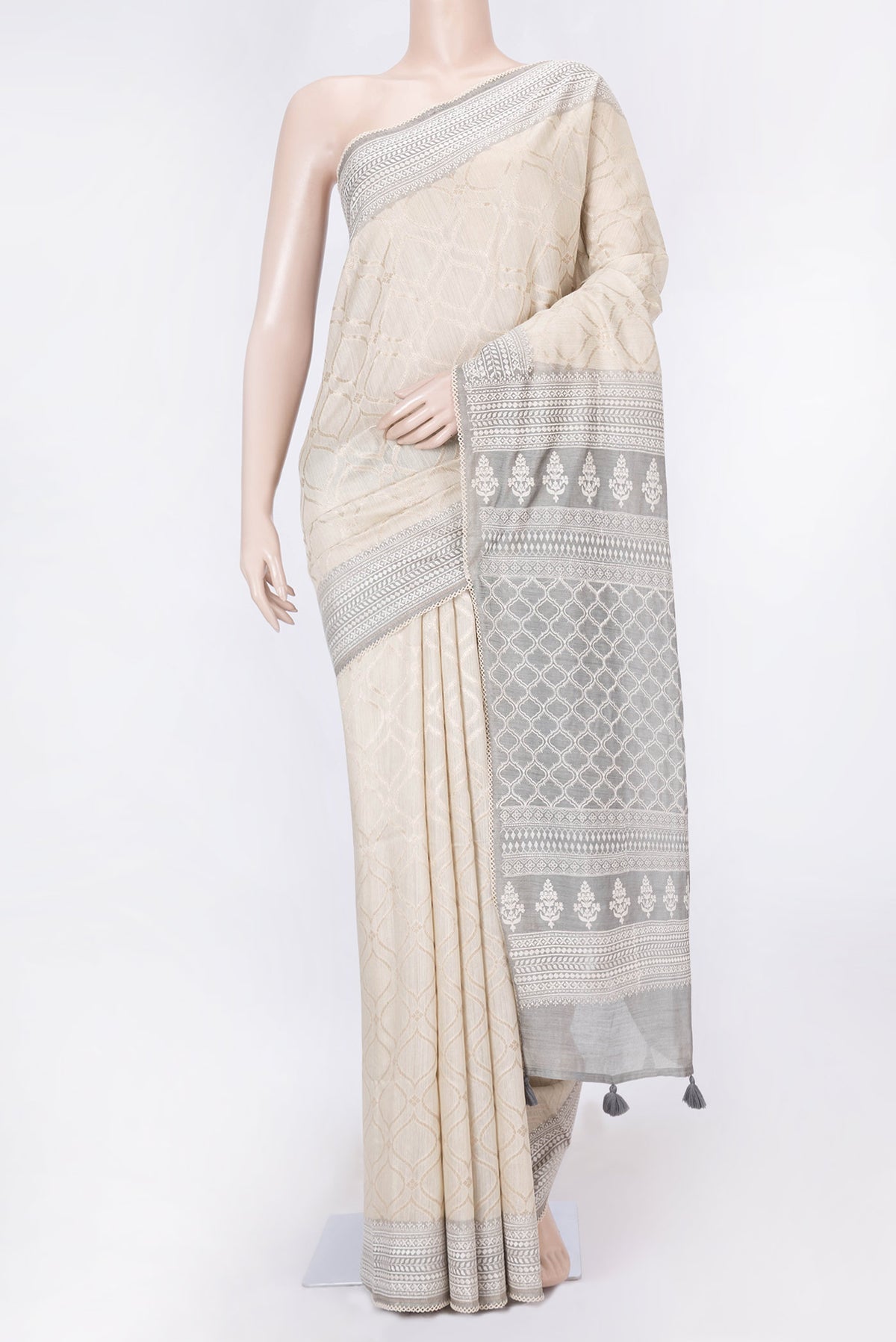Sandal Dual Tone Tussar Silk Saree with Zari Brocade on the body and Embroidery Border displayed on a mannequin