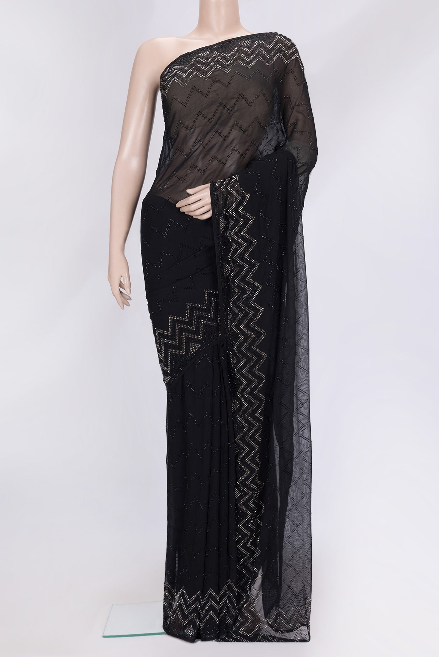 Black Dual Tone Georgette Saree with Embroidery on the body and Embroidery Border.  displayed on a mannequin