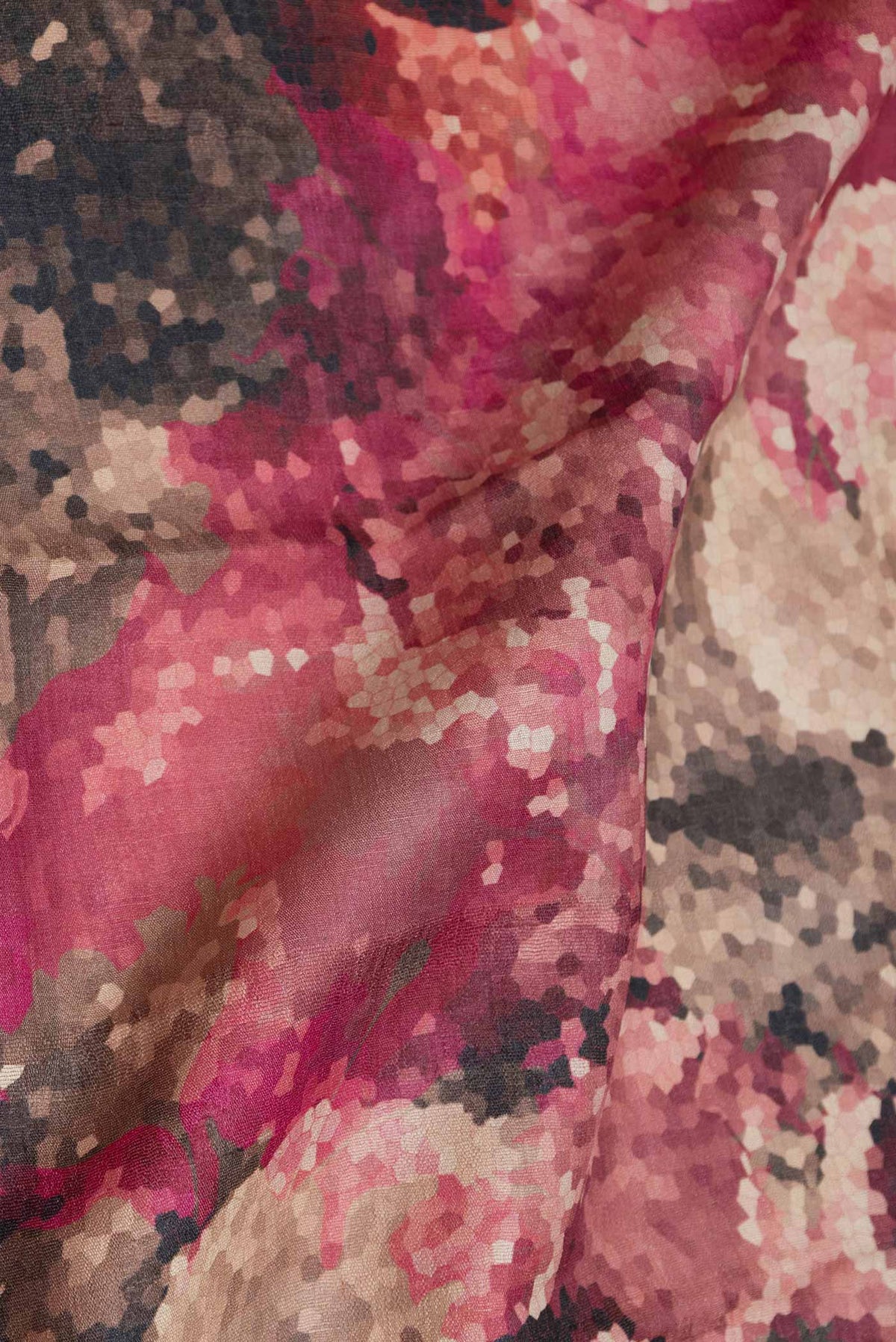 Close up of Pink Dual Tone Tussar Silk Saree with Printed design on the body and Zari Border displaying folds
