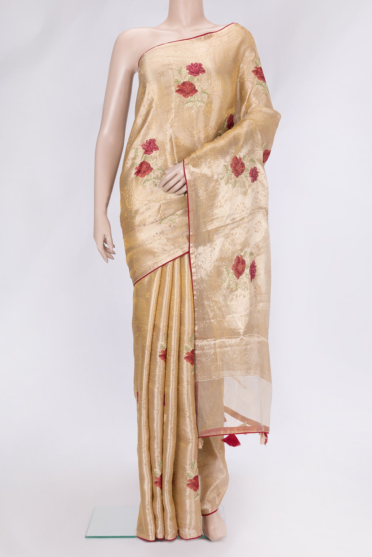 Gold Dual Tone Organza Silk Saree with Zari Brocade on the body and Zari Border.  displayed on a mannequin