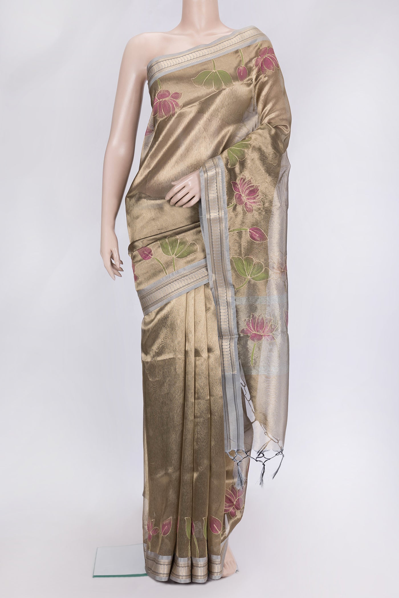 Brown Dual Tone Organza Silk Saree with Plain Body and Fancy Border.  displayed on a mannequin