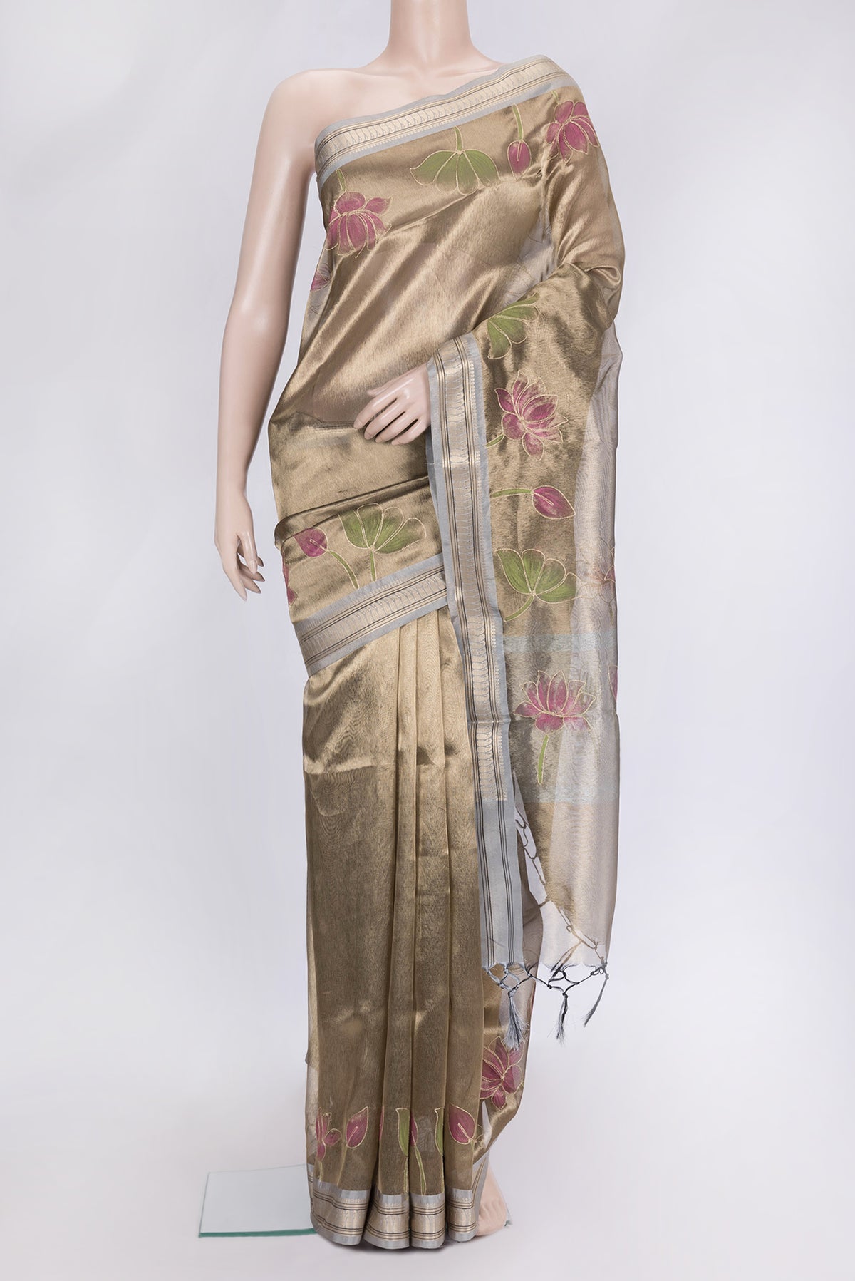 Brown Dual Tone Organza Silk Saree with Plain Body and Fancy Border.  displayed on a mannequin