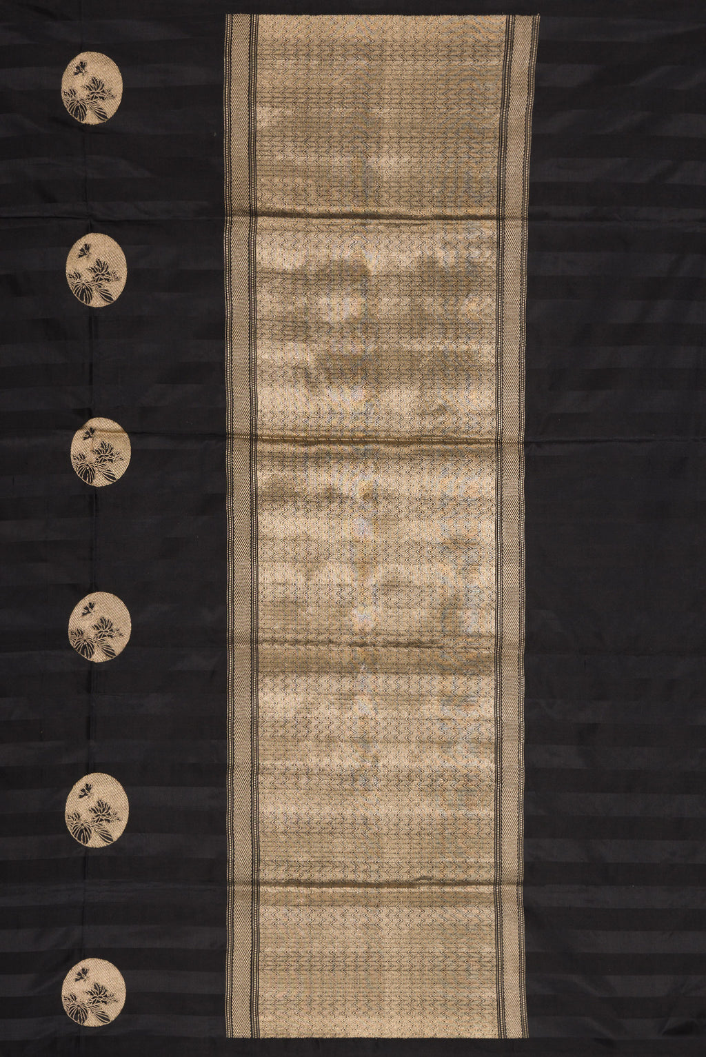 Close up image of the pallu of Black Dual Tone Banarasi Silk Saree with Zari Butta on the body and Without Border. 