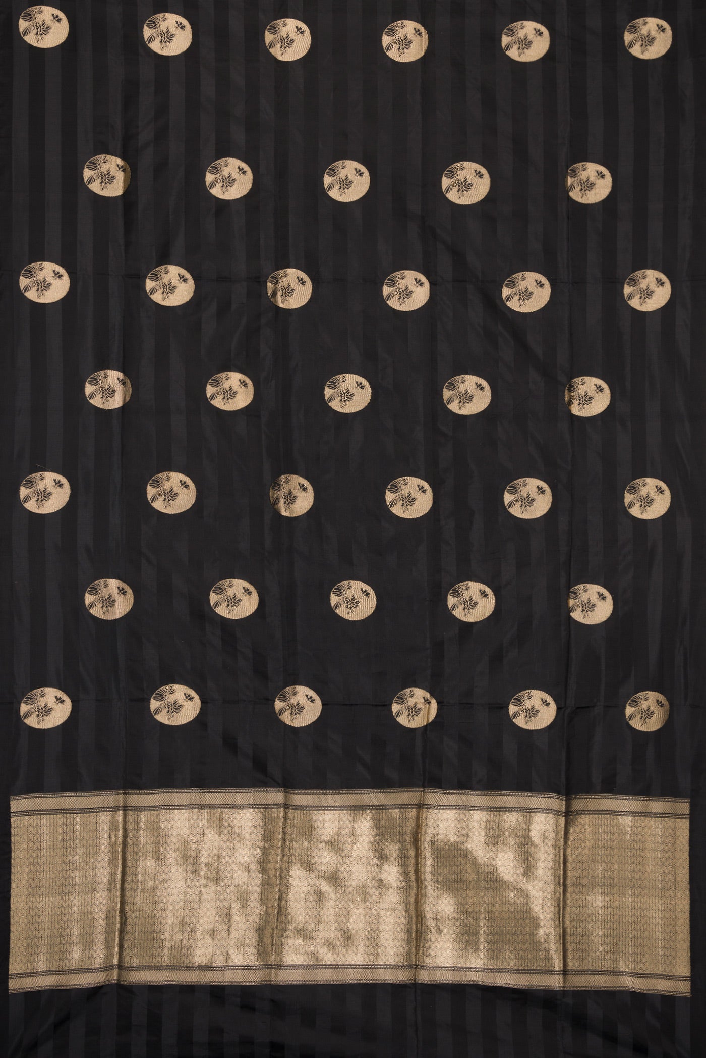 Flat view of Black Dual Tone Banarasi Silk Saree with Zari Butta on the body and Without Border. 