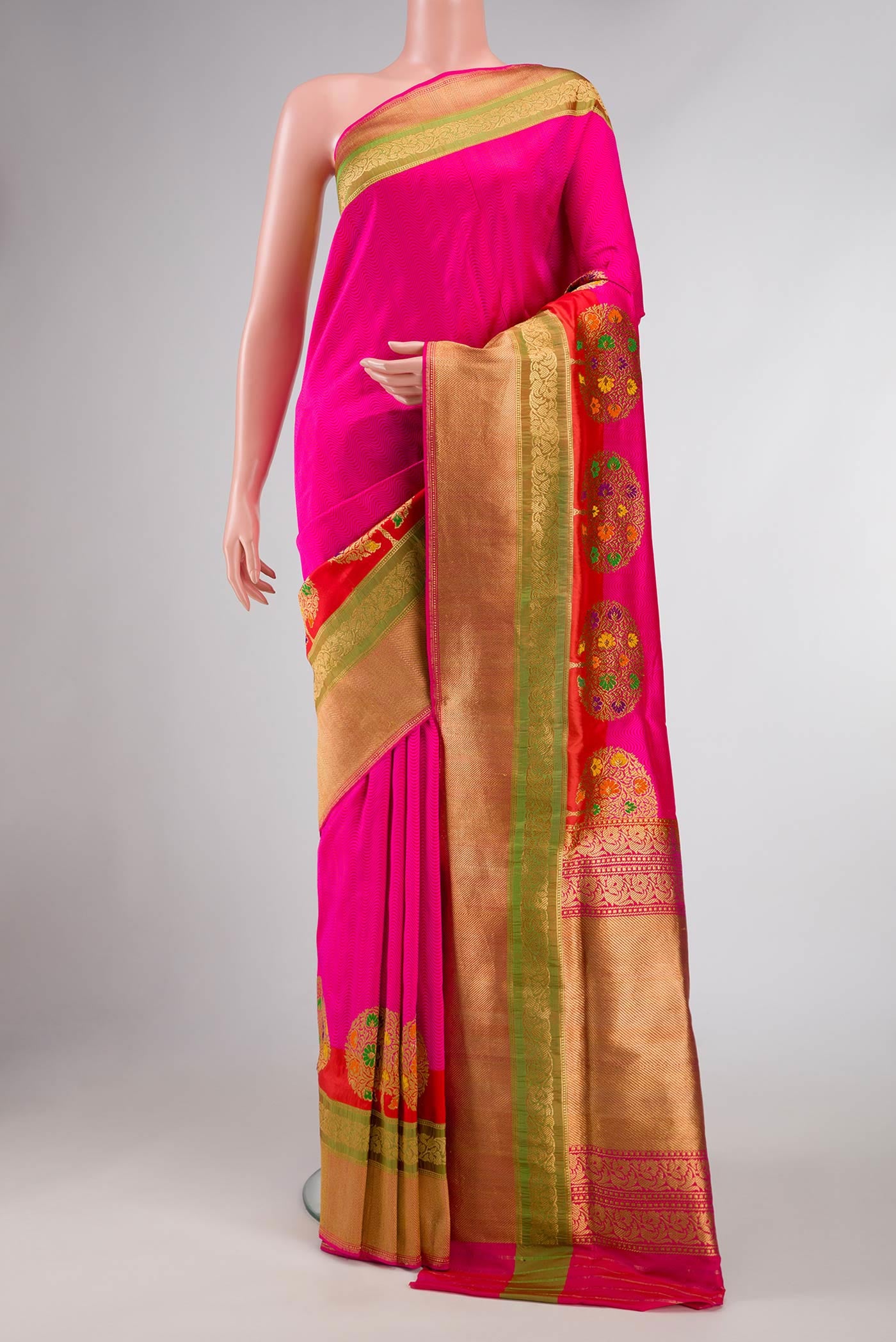 Pure Silk Pure Zari Pink Dual Tone Banarasi Saree with Jacquard design on the body and Fancy Border displayed on a mannequin