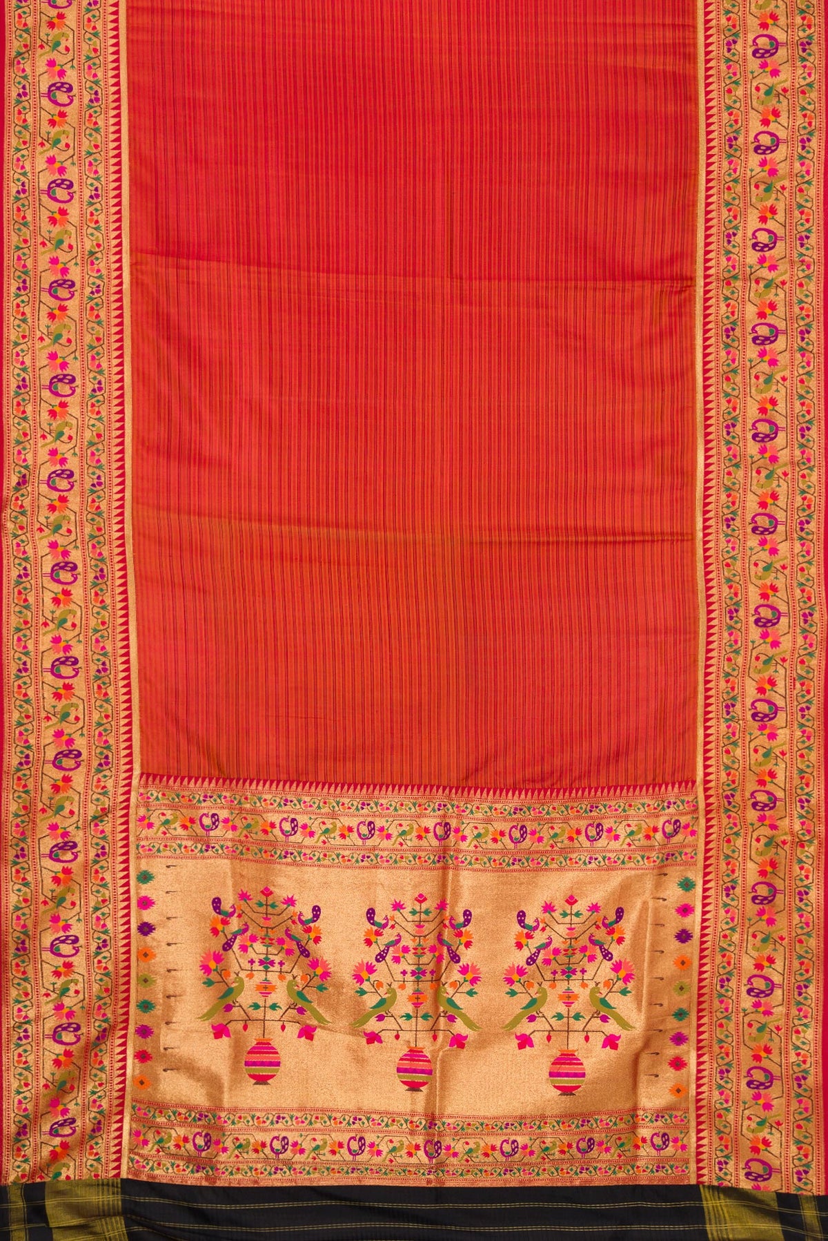 Flat view of Red Dual Tone Rajkot Patola Silk Saree with Stripes on the body and Paithani Border. 