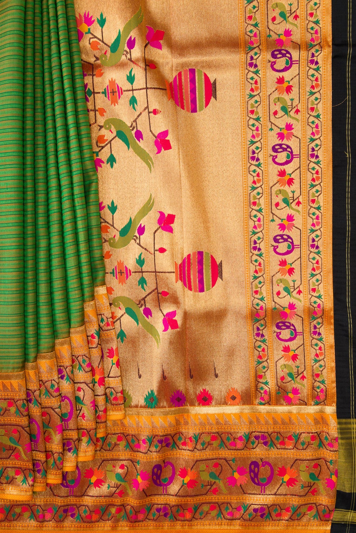 Pleats and pallu of Green Dual Tone Rajkot Patola Silk Saree with Stripes on the body and Paithani Border. 