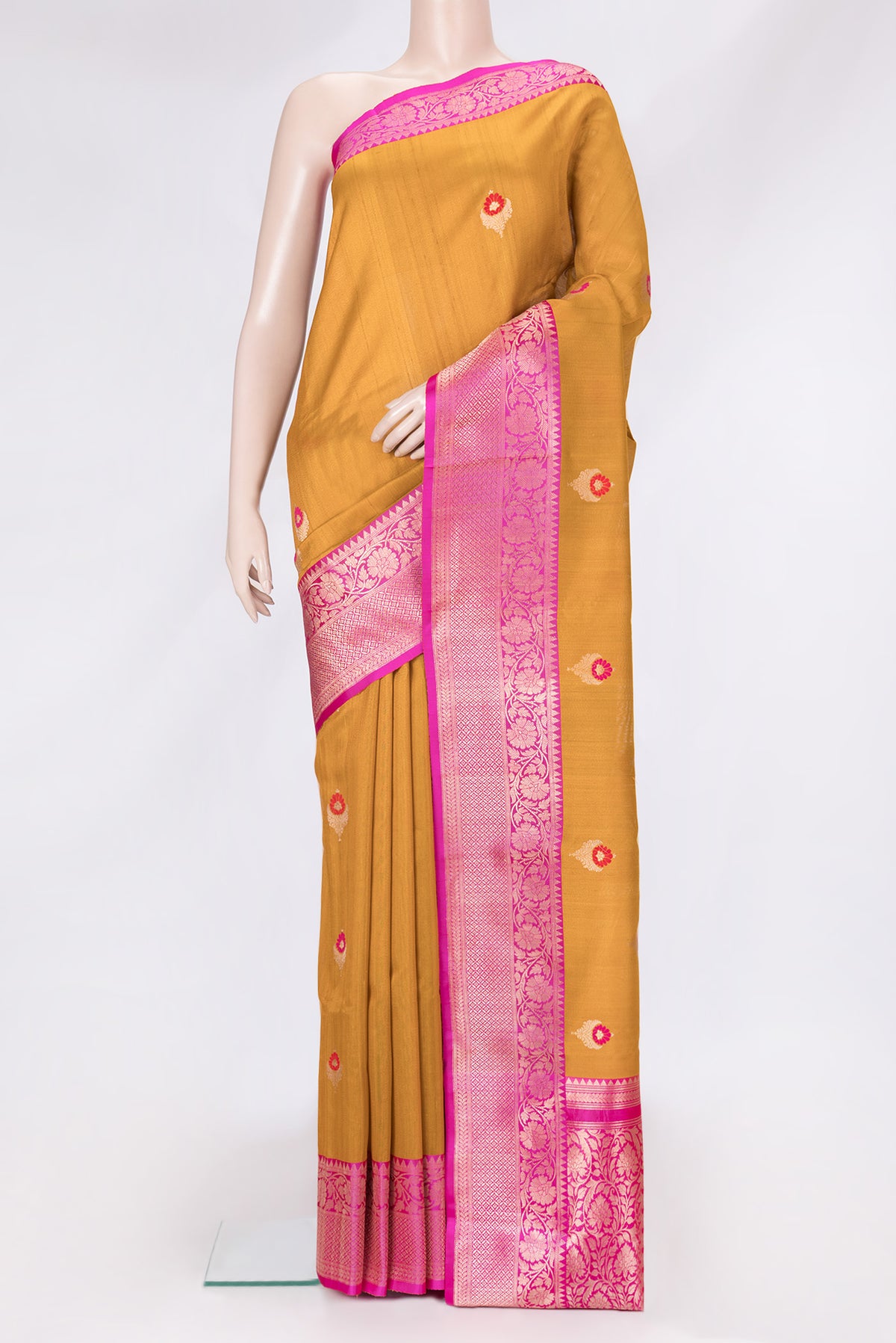 Mustard Dual Tone Tussar Silk Saree with Zari And Thread Butta on the body and Zari Border.  displayed on a mannequin