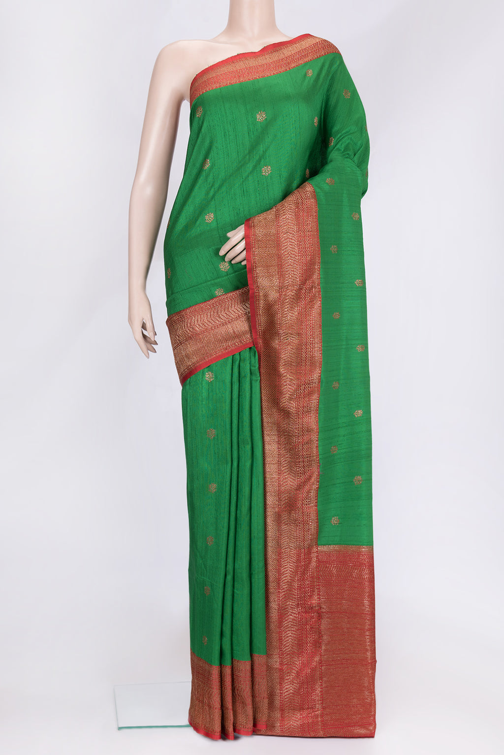 Green Dual Tone Raw Silk Saree with Zari Butta on the body and Zari Border.  displayed on a mannequin
