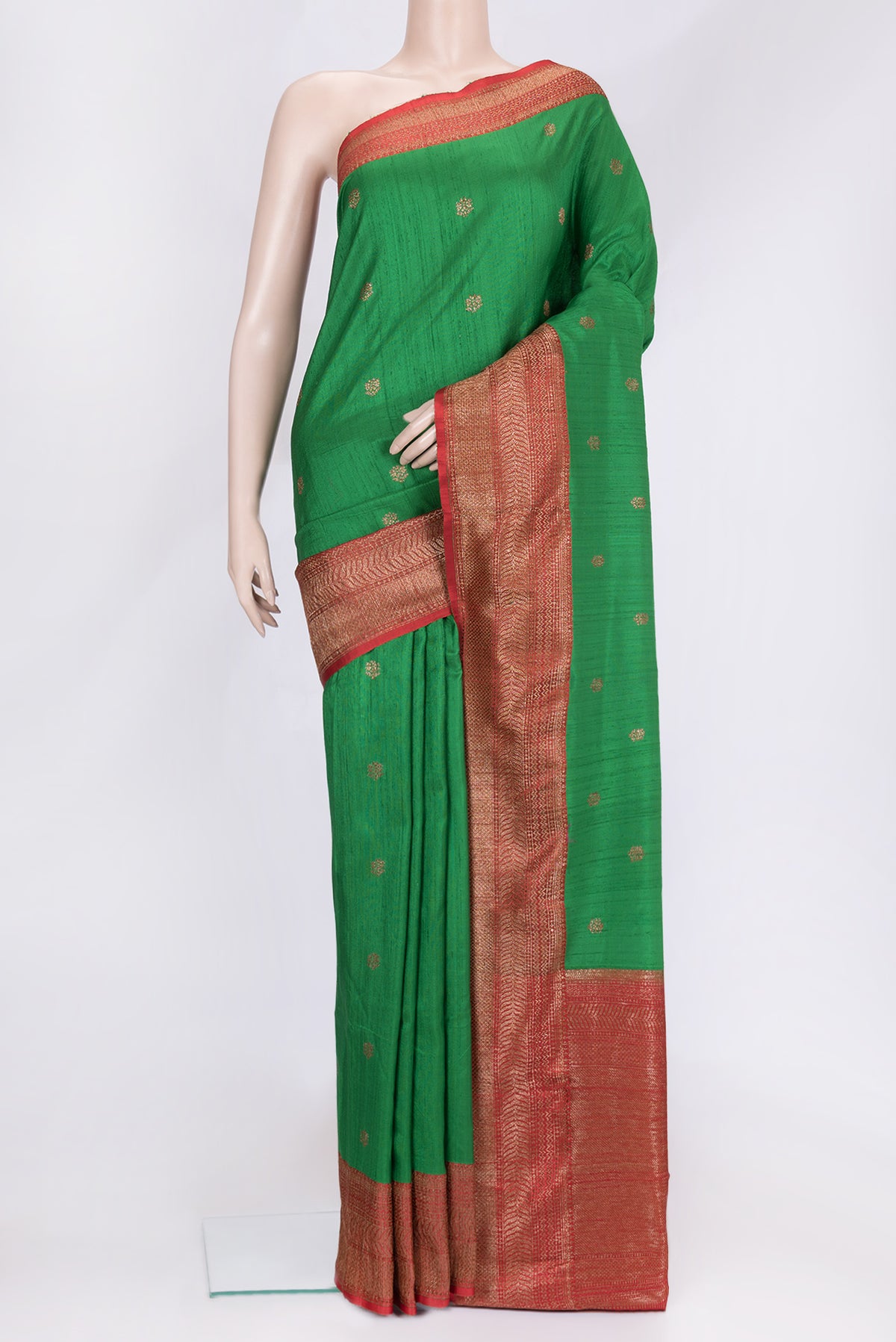 Green Dual Tone Raw Silk Saree with Zari Butta on the body and Zari Border.  displayed on a mannequin