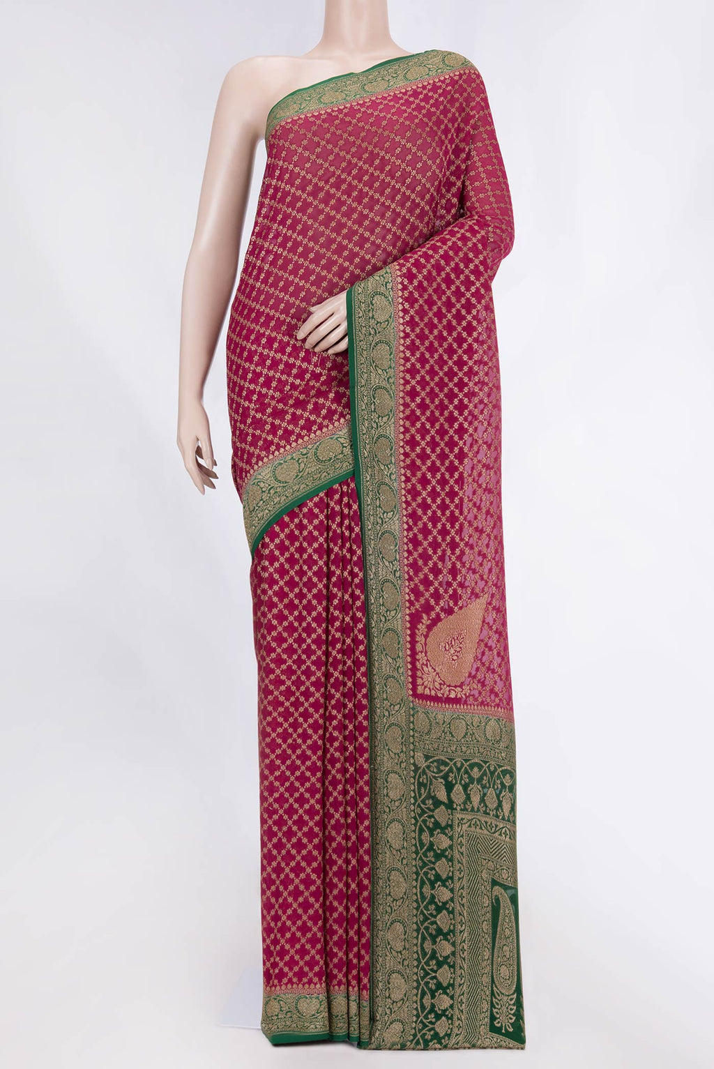 Magenta Banarasi Georgette Saree with Zari Brocade on the body and Zari Border displayed on a mannequin