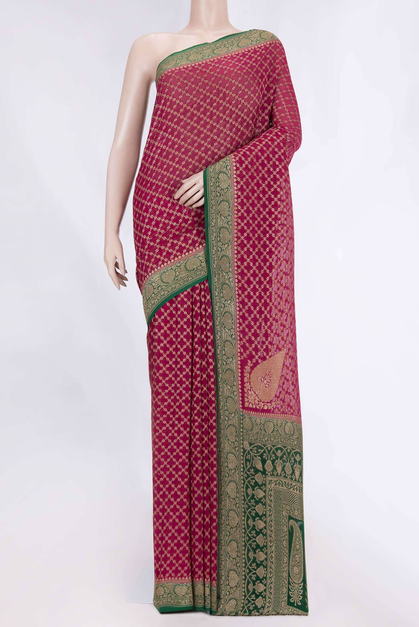 Magenta Banarasi Georgette Saree with Zari Brocade on the body and Zari Border displayed on a mannequin