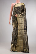 Black Dual Tone Kanchipuram Silk Saree with Zari Brocade on the body and Zari Border.  displayed on a mannequin