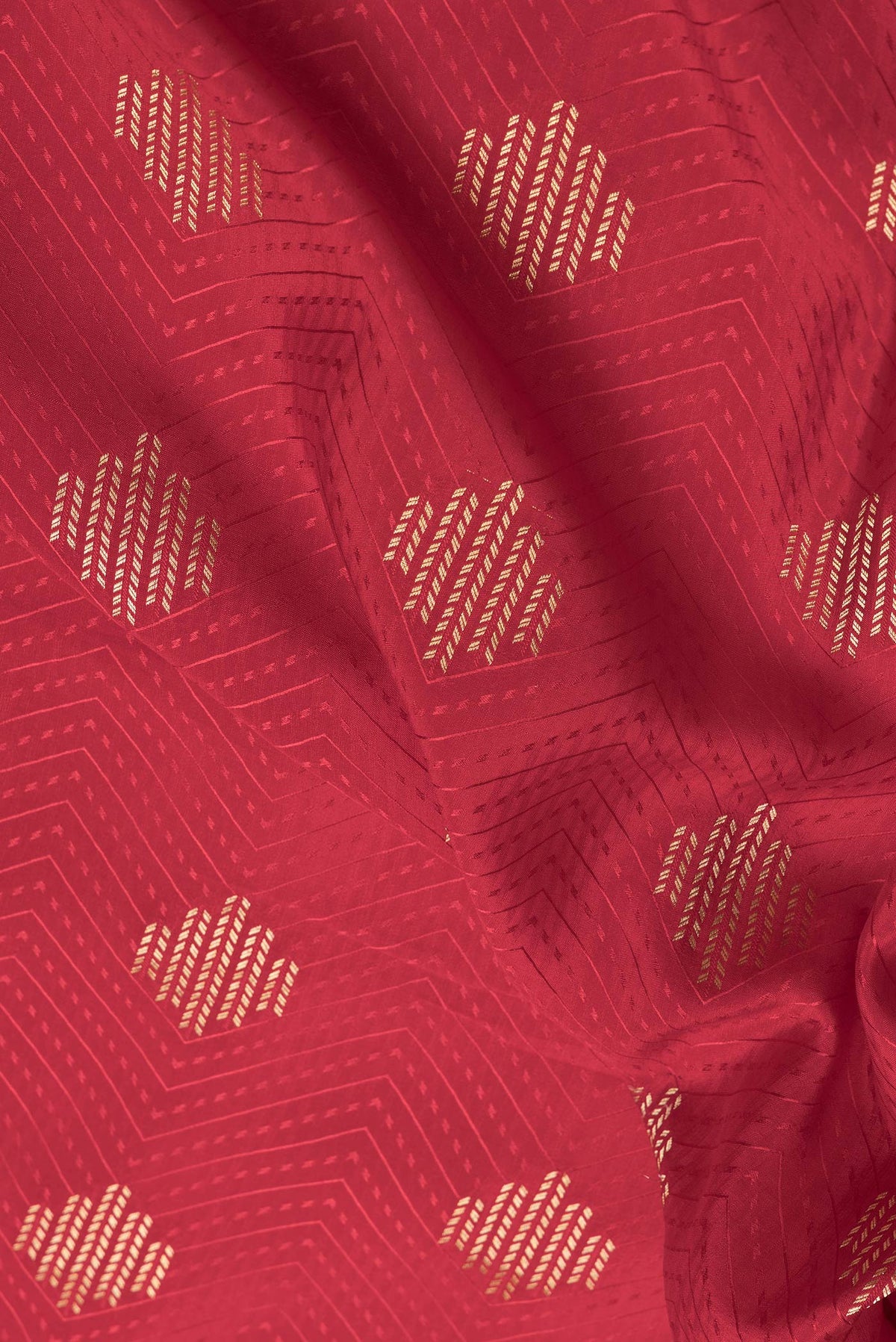 Close up of Red Dual Tone Mysore Silk Saree with Jacquard With Zari Butta on the body and Zari Border.  displaying folds
