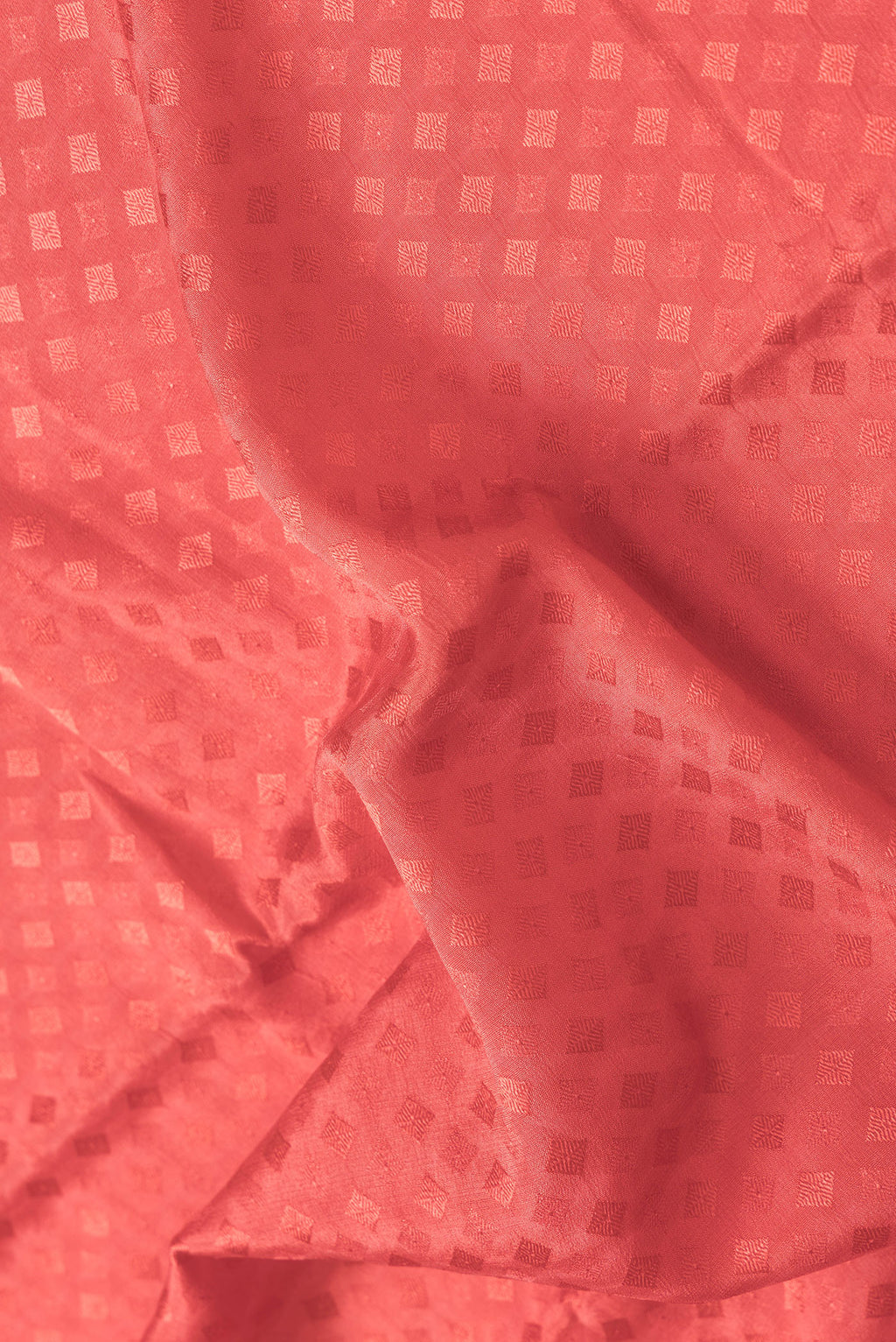 Close up of Pink Dual Tone Mysore Georgette Saree with Jacquard design on the body and Zari Border.  displaying folds