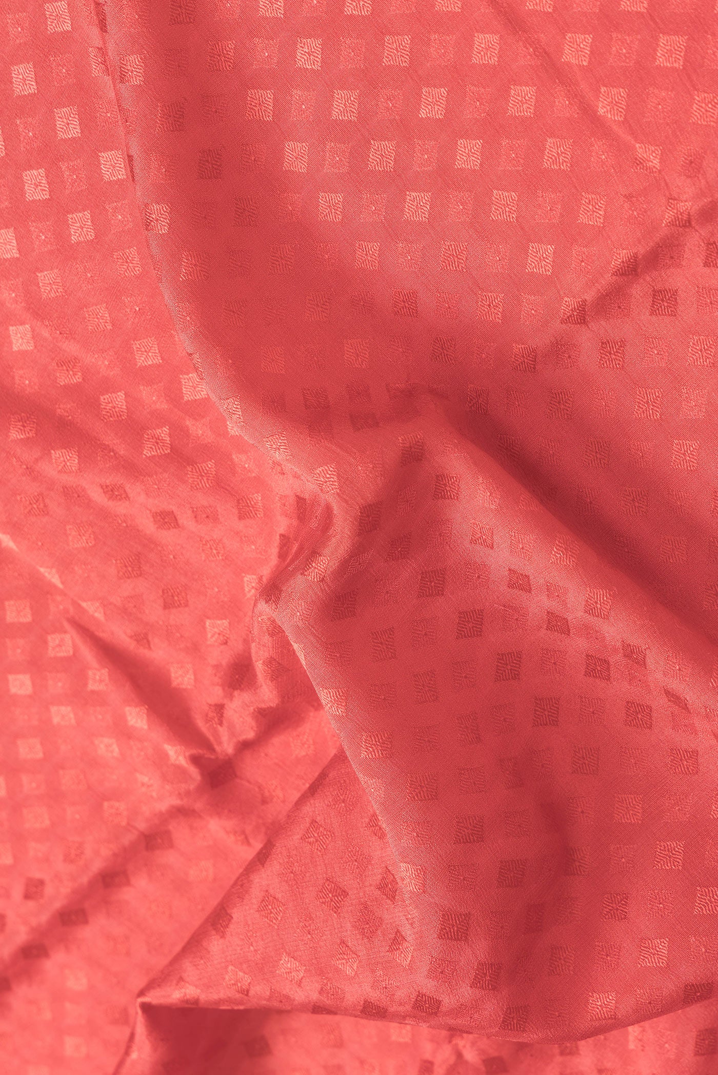 Close up of Pink Dual Tone Mysore Georgette Saree with Jacquard design on the body and Zari Border.  displaying folds