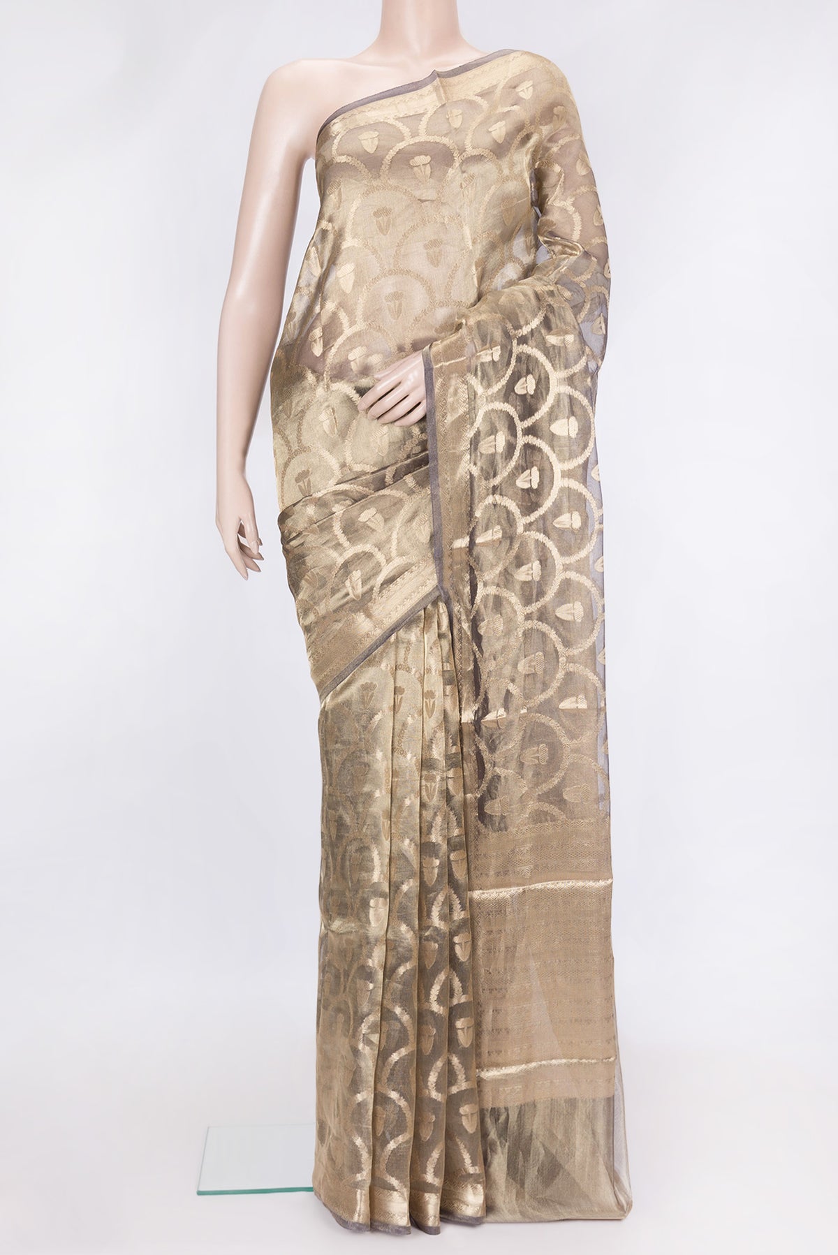 Gold Dual Tone Organza Silk Saree with Zari Brocade on the body and Zari Border.  displayed on a mannequin