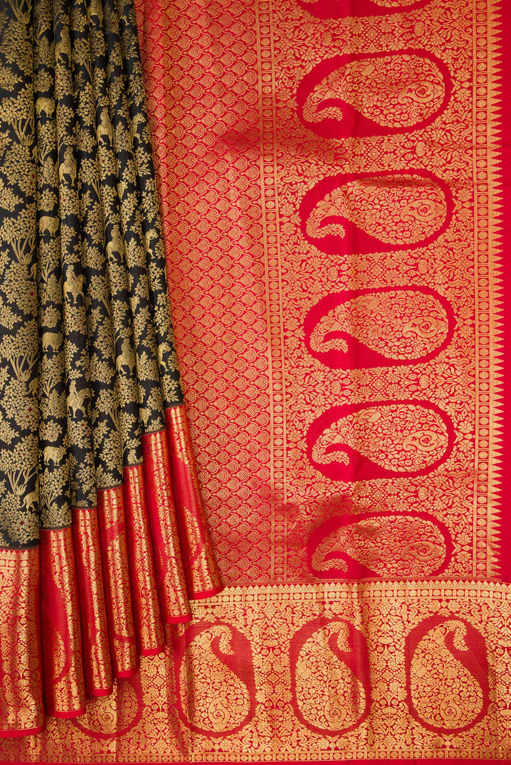 Pleats and pallu of Black Kanchipuram Silk Saree with Zari Brocade on the body and Zari Border. 