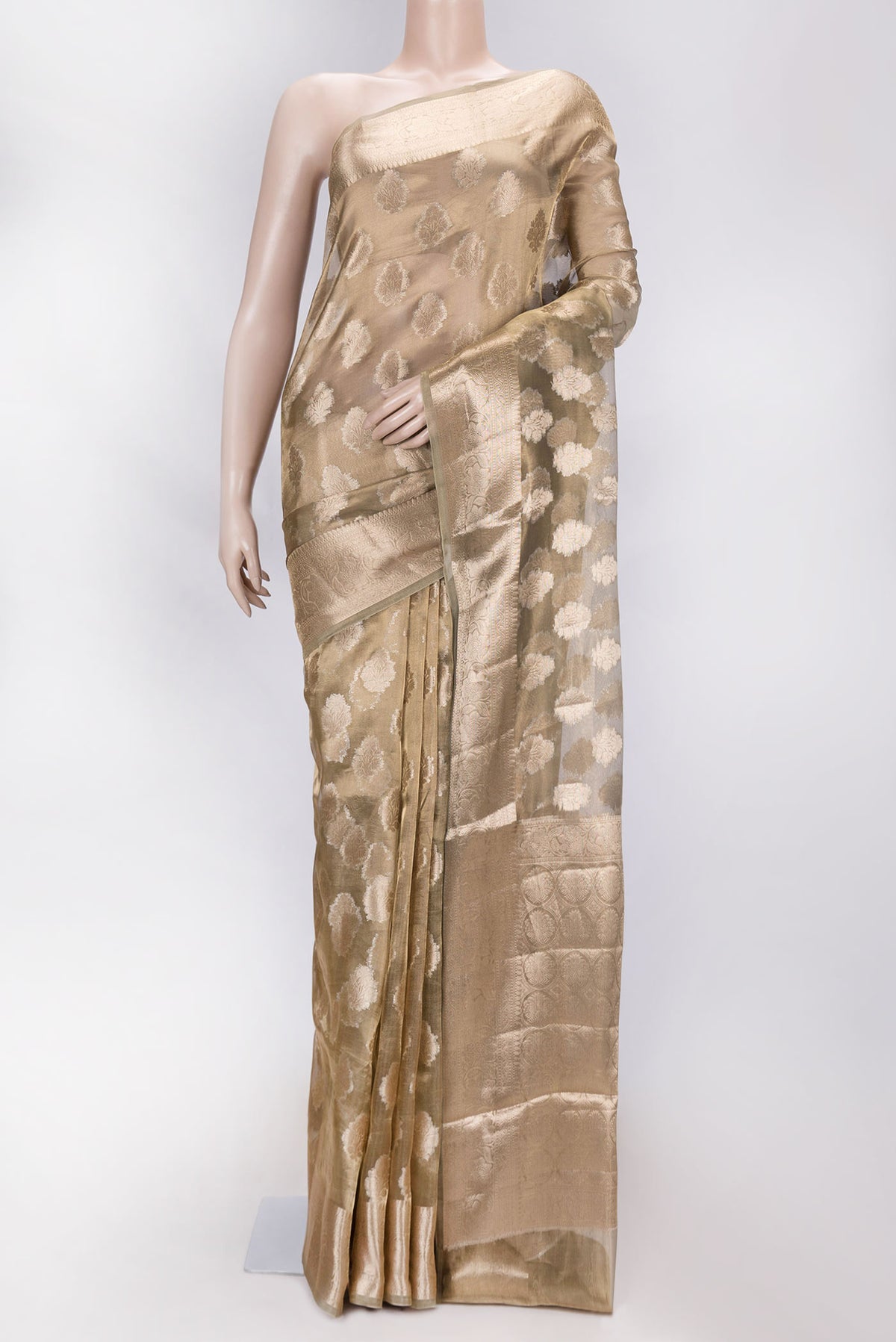 Mehandi Green Dual Tone Organza Silk Saree with Zari Butta on the body and Zari Border displayed on a mannequin