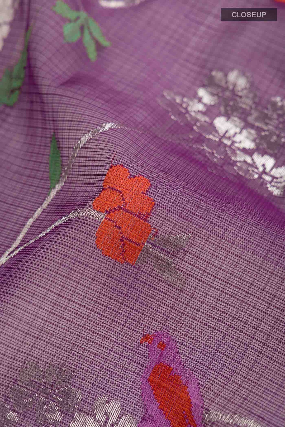 Close up of Blue Kota Silk Saree with Zari And Thread Butta on the body and Zari Border displaying folds