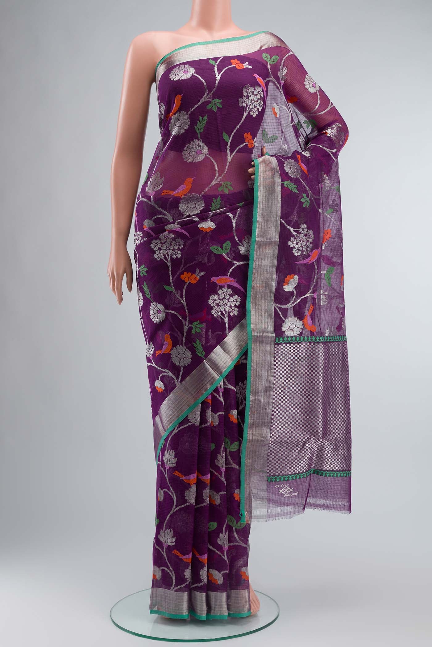 Blue Kota Silk Saree with Zari And Thread Butta on the body and Zari Border displayed on a mannequin