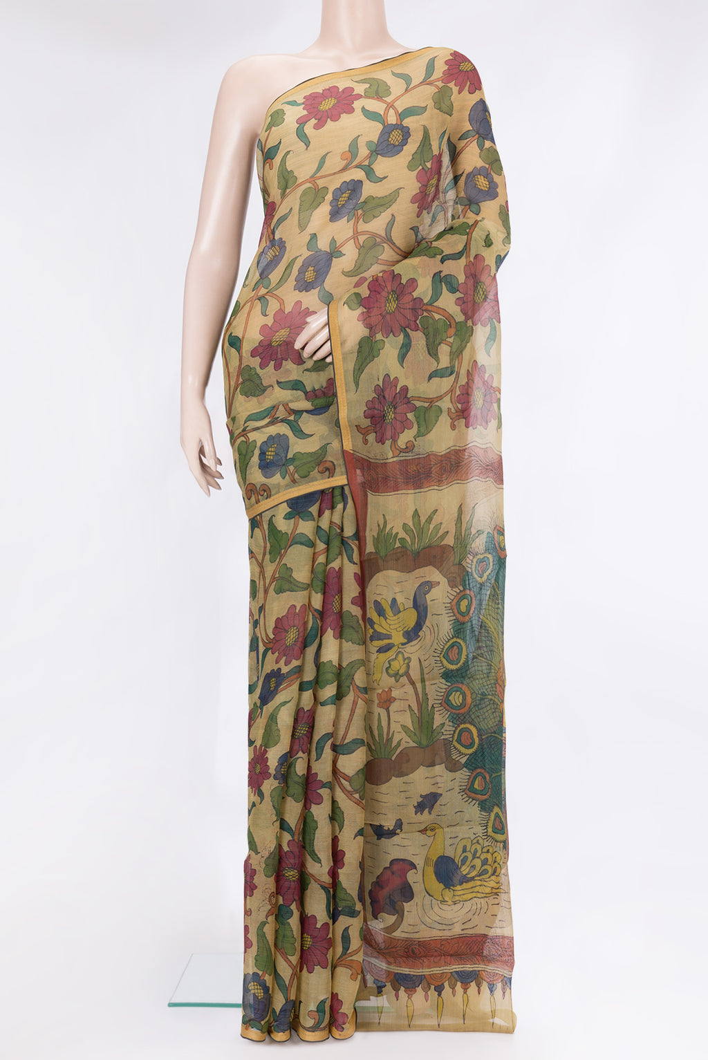 Beige Organza Silk Saree with kalamkari Print on the body and Thread Border.  displayed on a mannequin