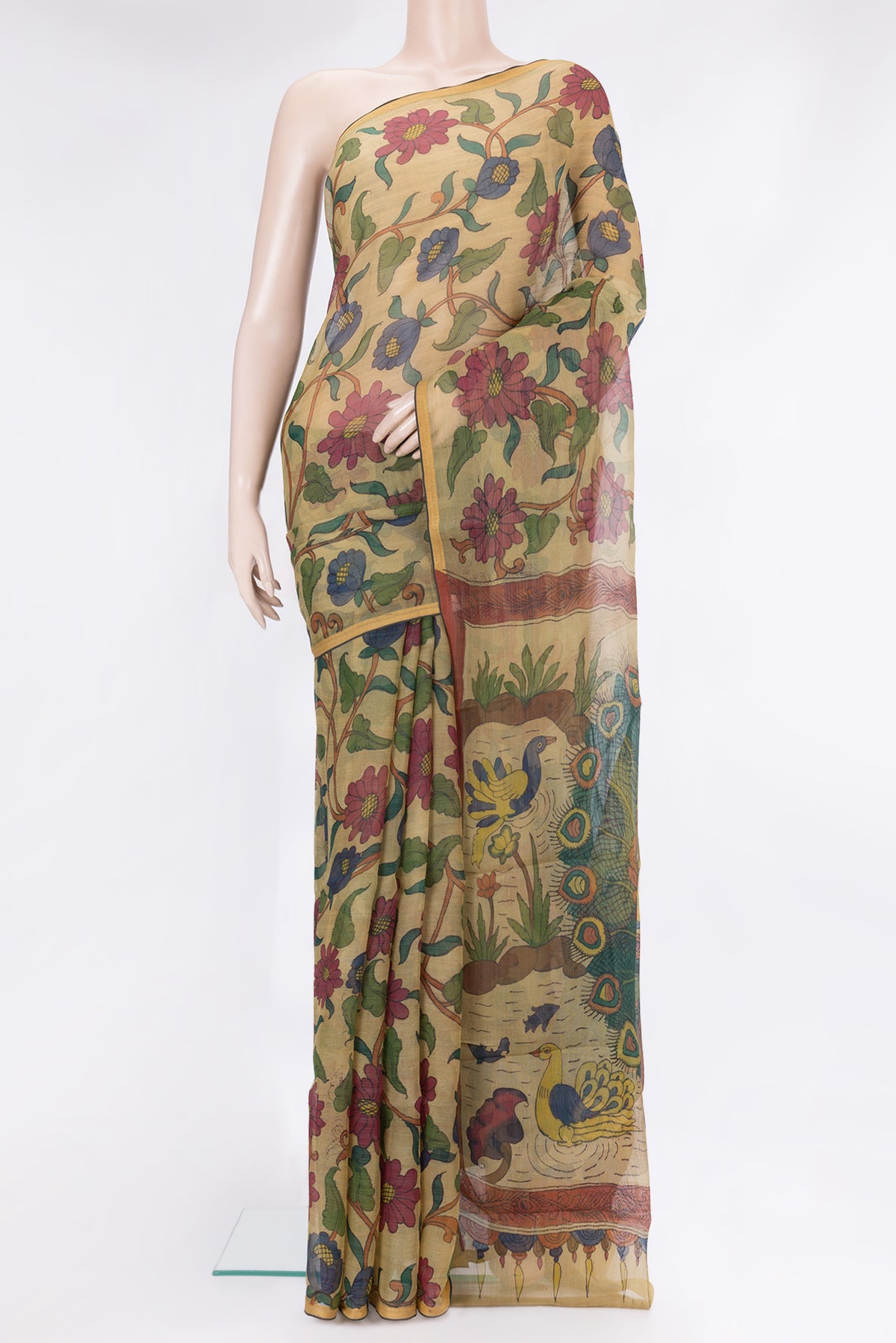 Beige Organza Silk Saree with kalamkari Print on the body and Thread Border.  displayed on a mannequin