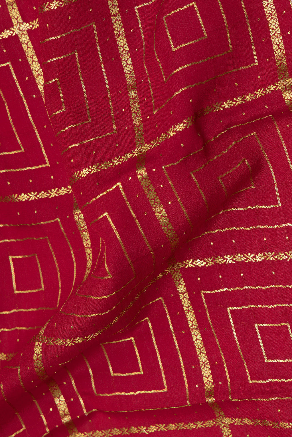 Close up of Maroon Mysore Silk Saree with Zari Brocade on the body and Zari Border.  displaying folds