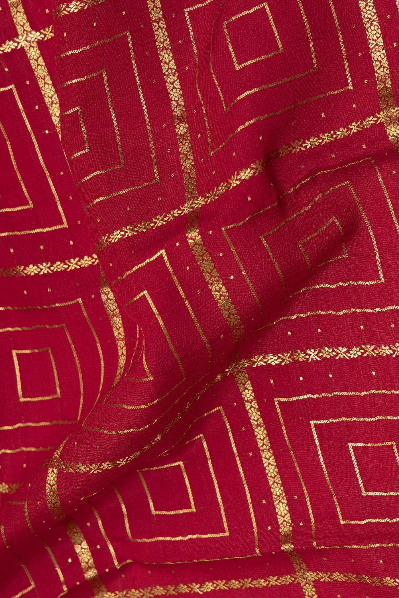 Close up of Maroon Mysore Silk Saree with Zari Brocade on the body and Zari Border.  displaying folds