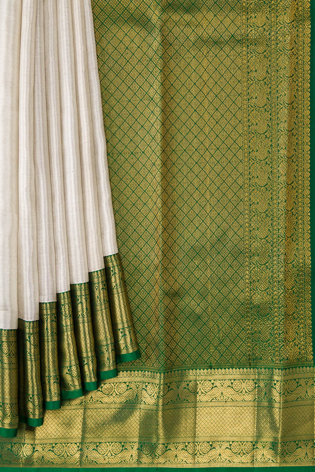 Pleats and pallu of Off White Dual Tone Kanchipuram Tissue Silk Saree with Plain Body and Zari Border. 
